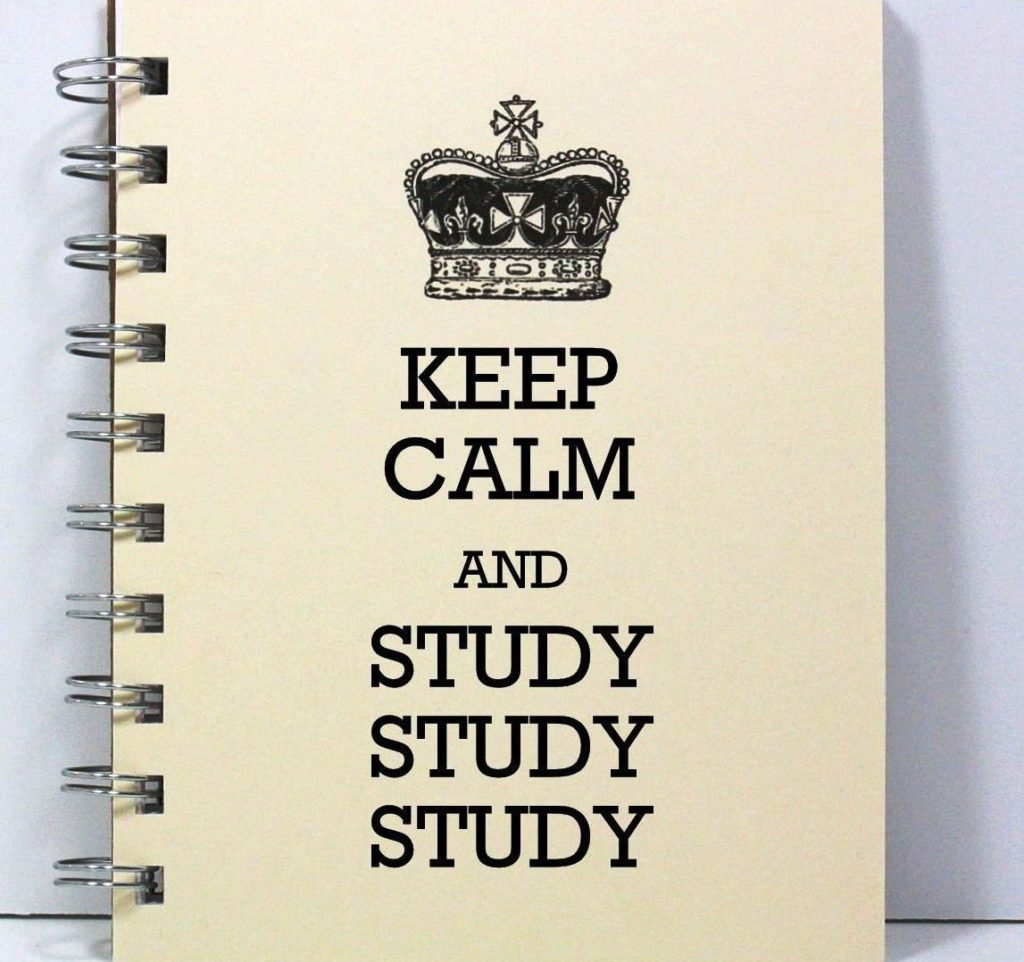 A notebook with the motivational phrase 'Keep Calm and Study Study Study' printed on it, encouraging focused learning and exam preparation