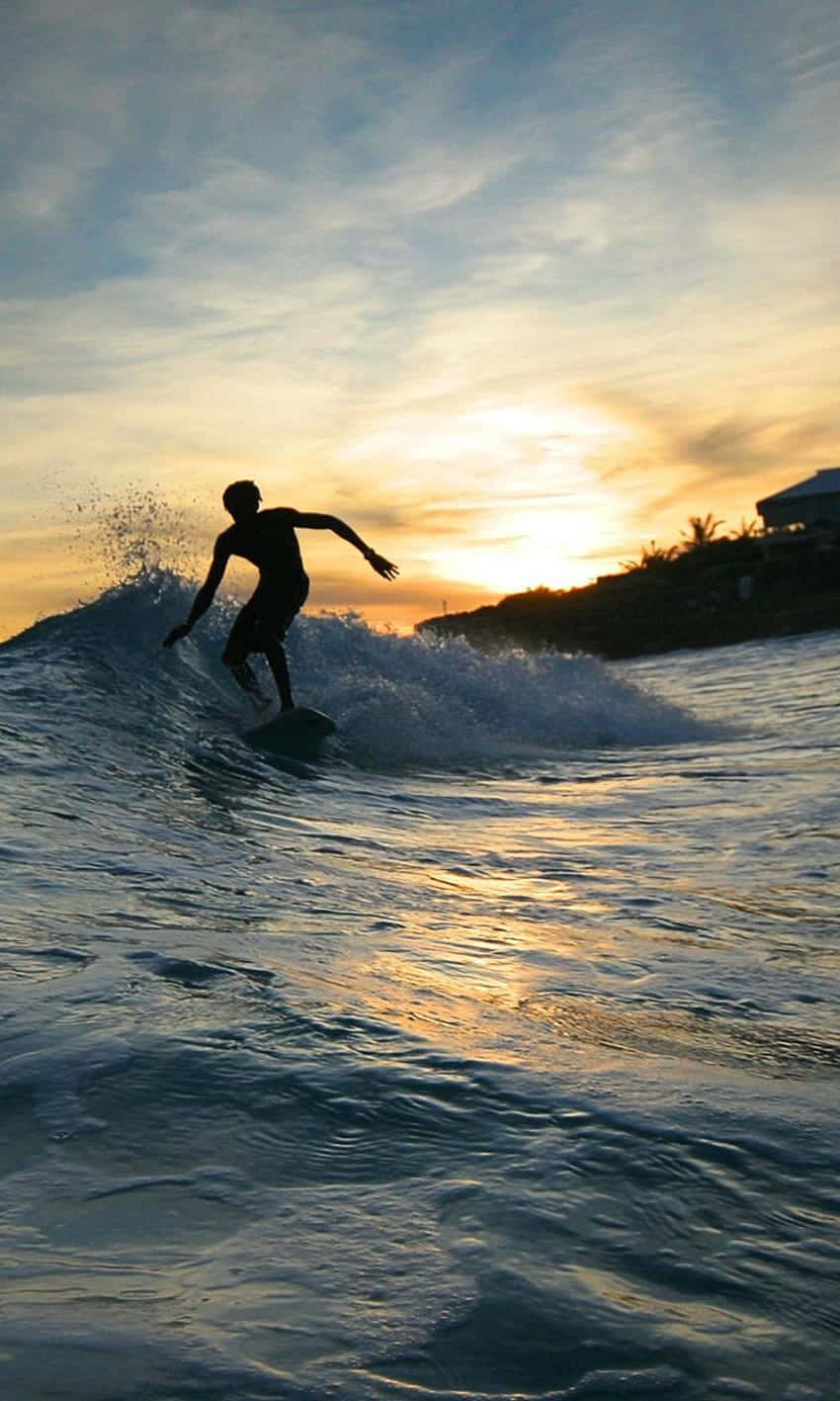 Ride The Waves With This Epic Surfing iPhone Wallpaper