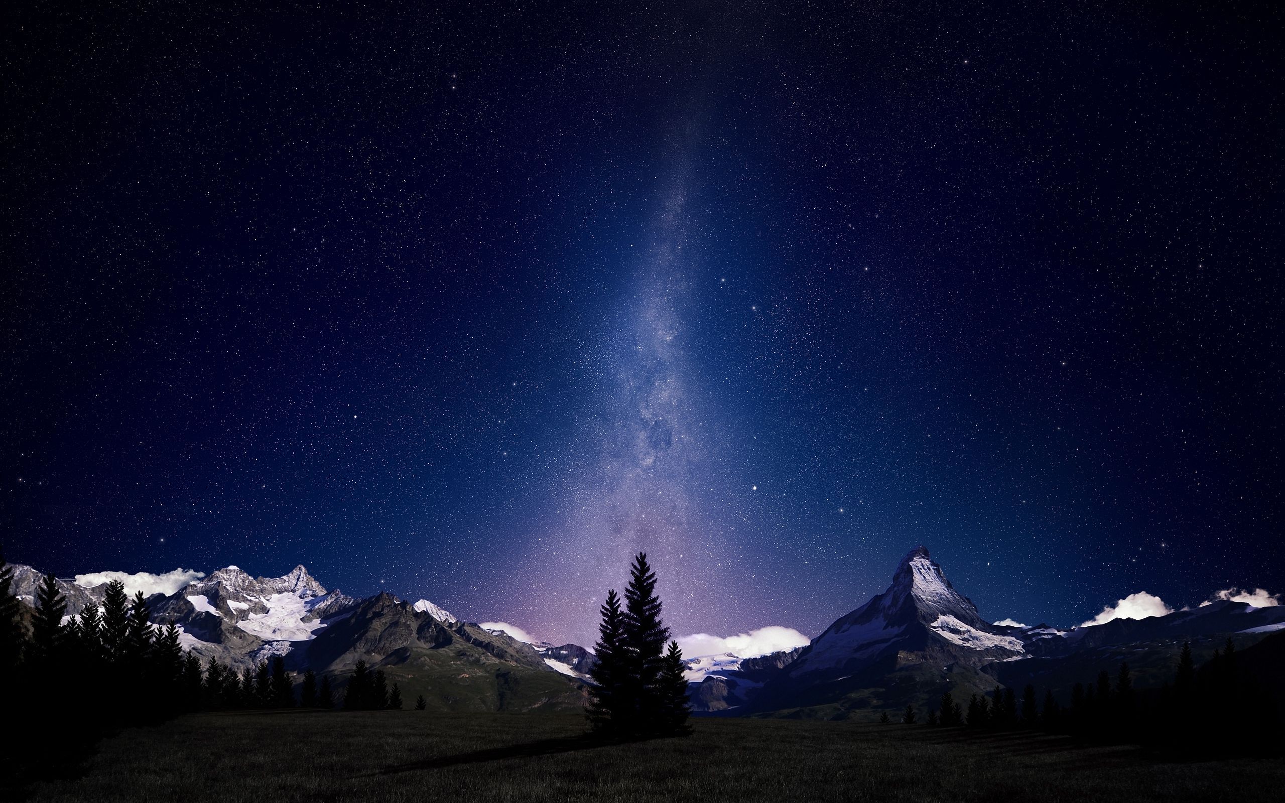 Download Night sky lights over snowy mountains wallpaper