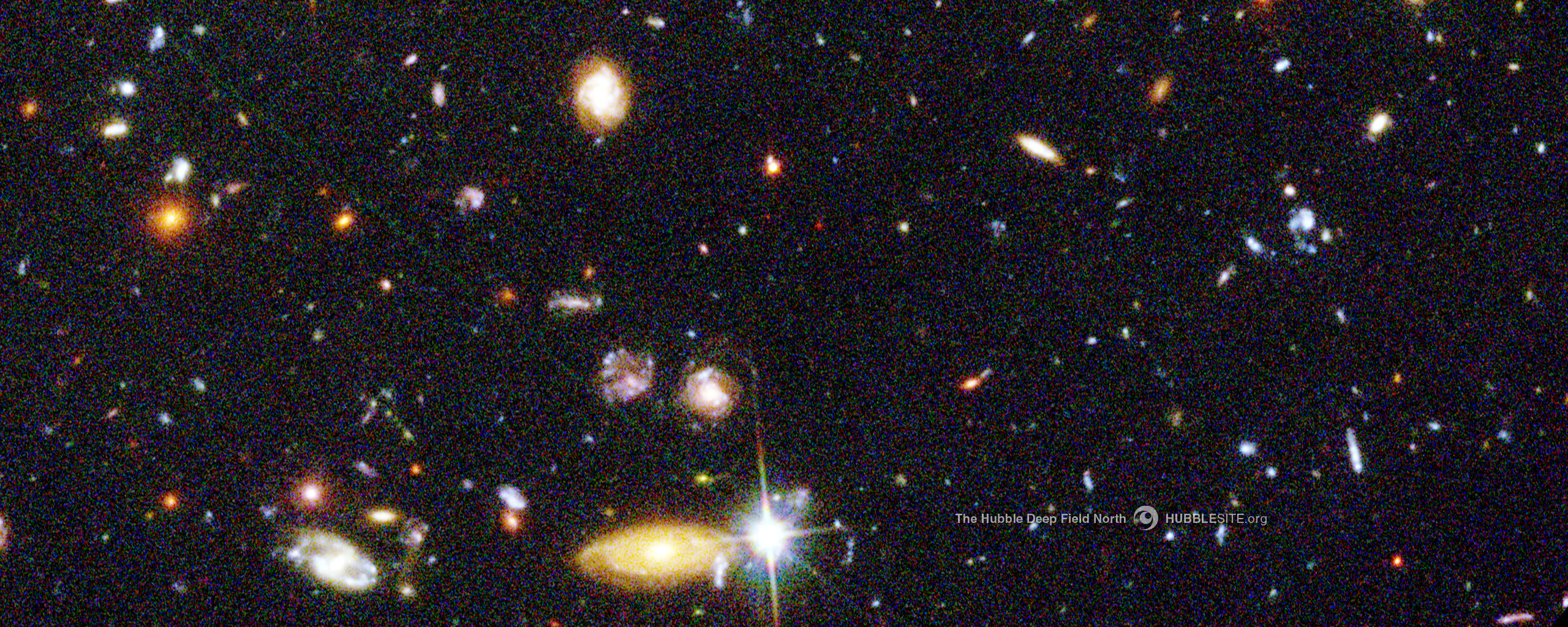 Image Hubble Deep Field Unveils Myriad Galaxies Back To The