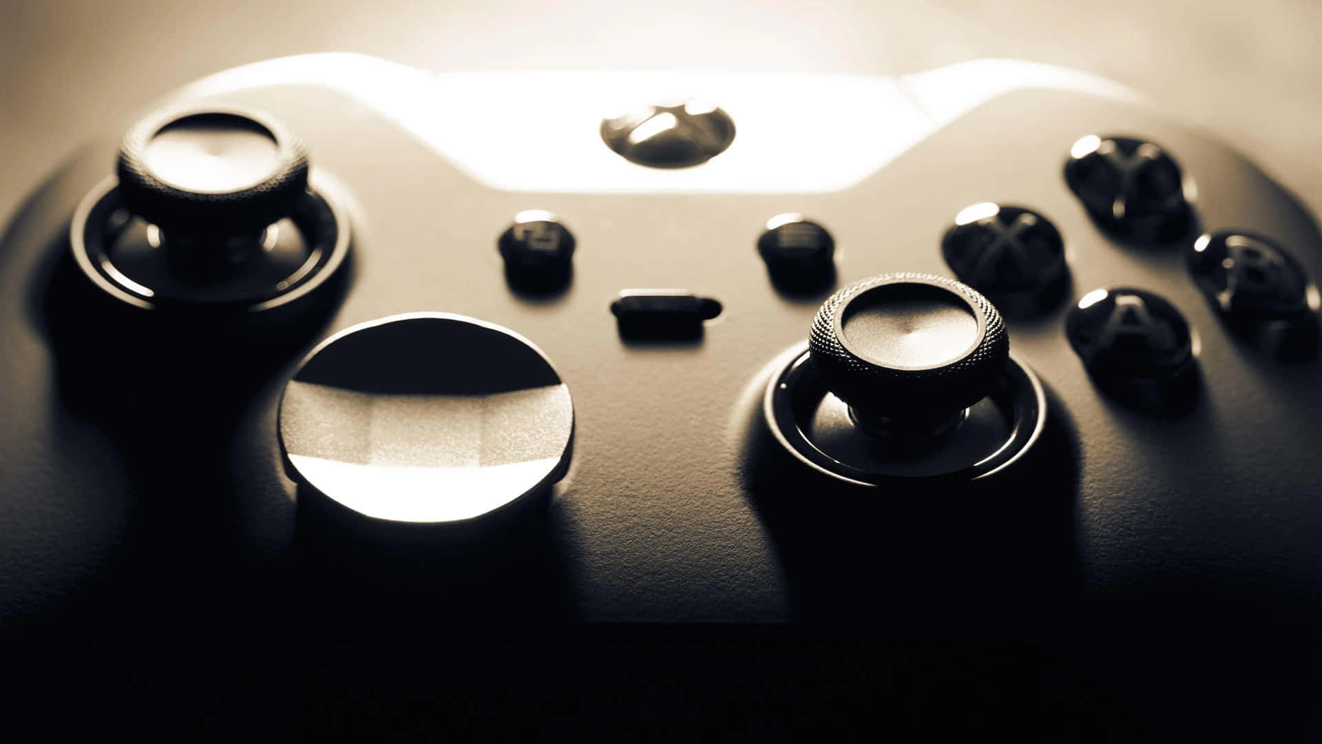 Close-up of an Xbox controller, highlighting its textured surface and buttons