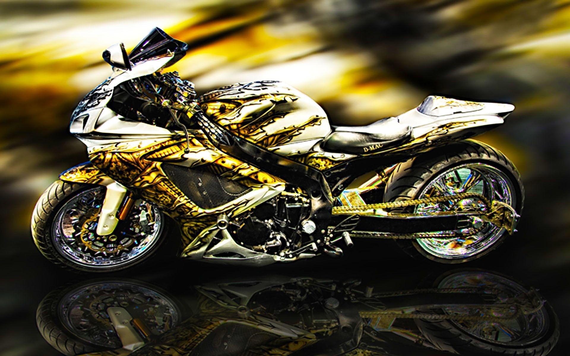 Custom-designed sports bike with gold and silver accents, reflecting in a dark surface