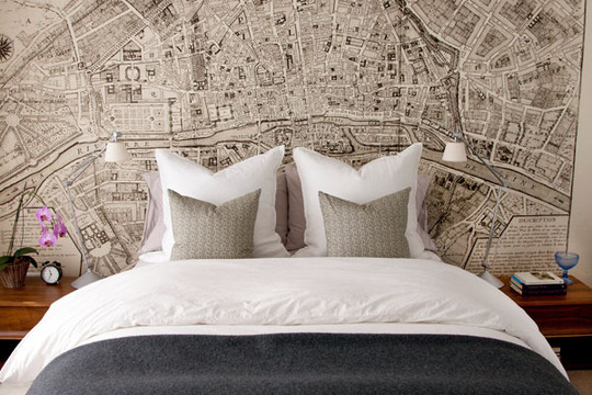  to a neutral bedroom with a vintage map of Paris as a wallpaper