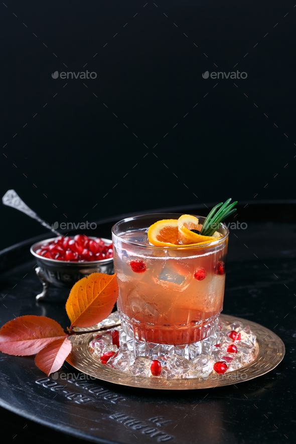 Red Alcoholic Coctail With Vodka And Juice On A Black Background