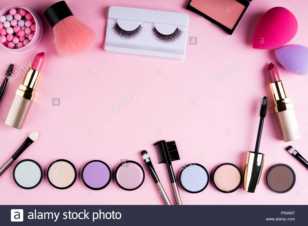Makeup Products And Decorative Cosmetics On Pink Background Flat