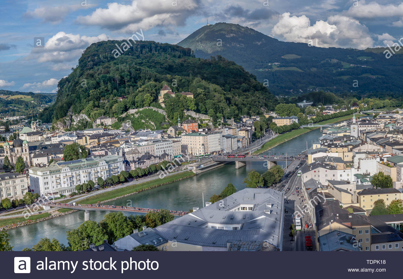 Salzach River With Green Hills Background On Cloudy Summer Day In