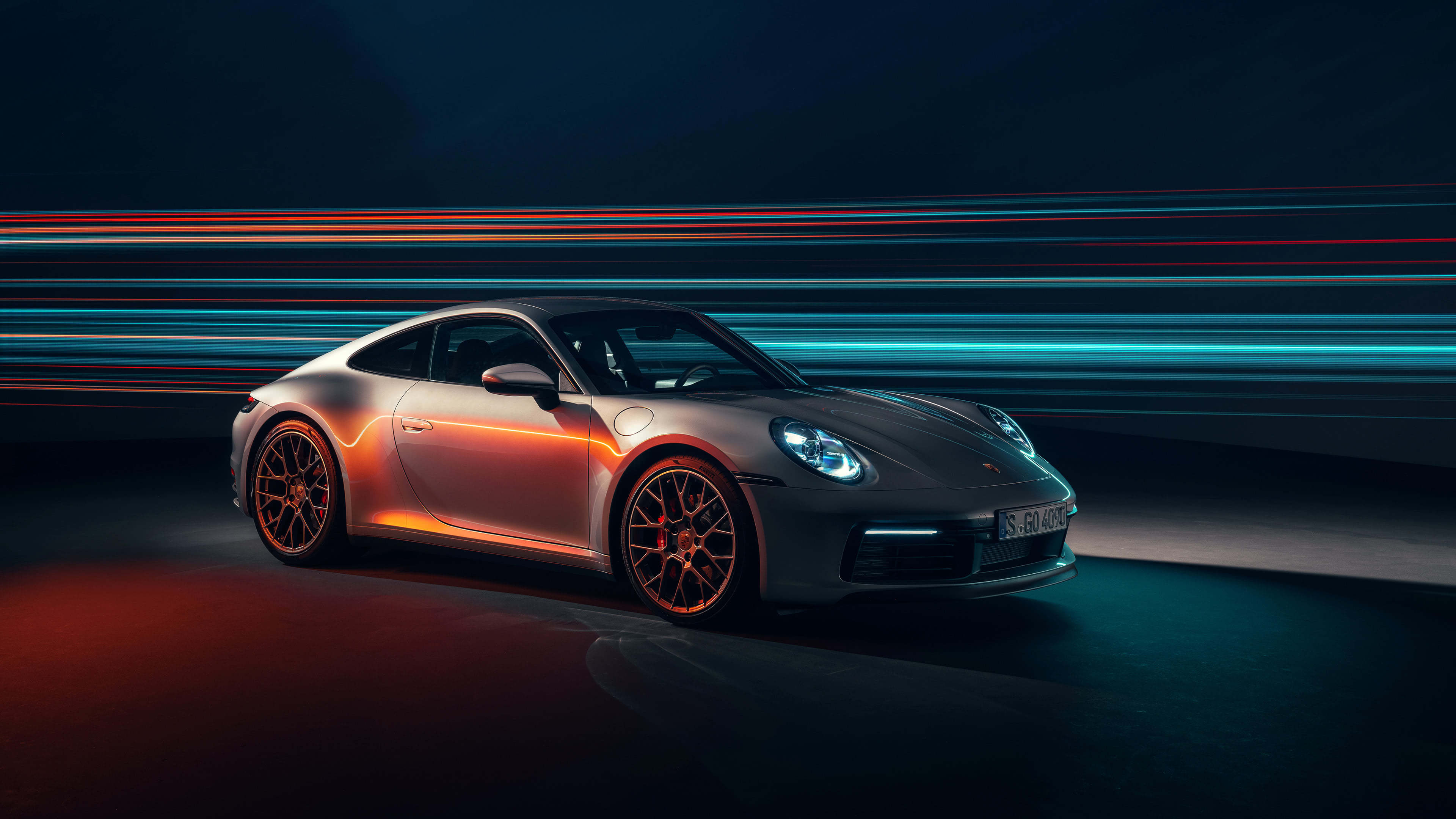 Bạn đang tìm kiếm hình nền đỉnh cao cho màn hình của mình? Không nên bỏ qua hình nền Porsche 911 Carrera UHD 4K tuyệt đẹp này. Tải xuống miễn phí và chiêm ngưỡng những đường nét hoàn hảo của chiếc xe Porsche.