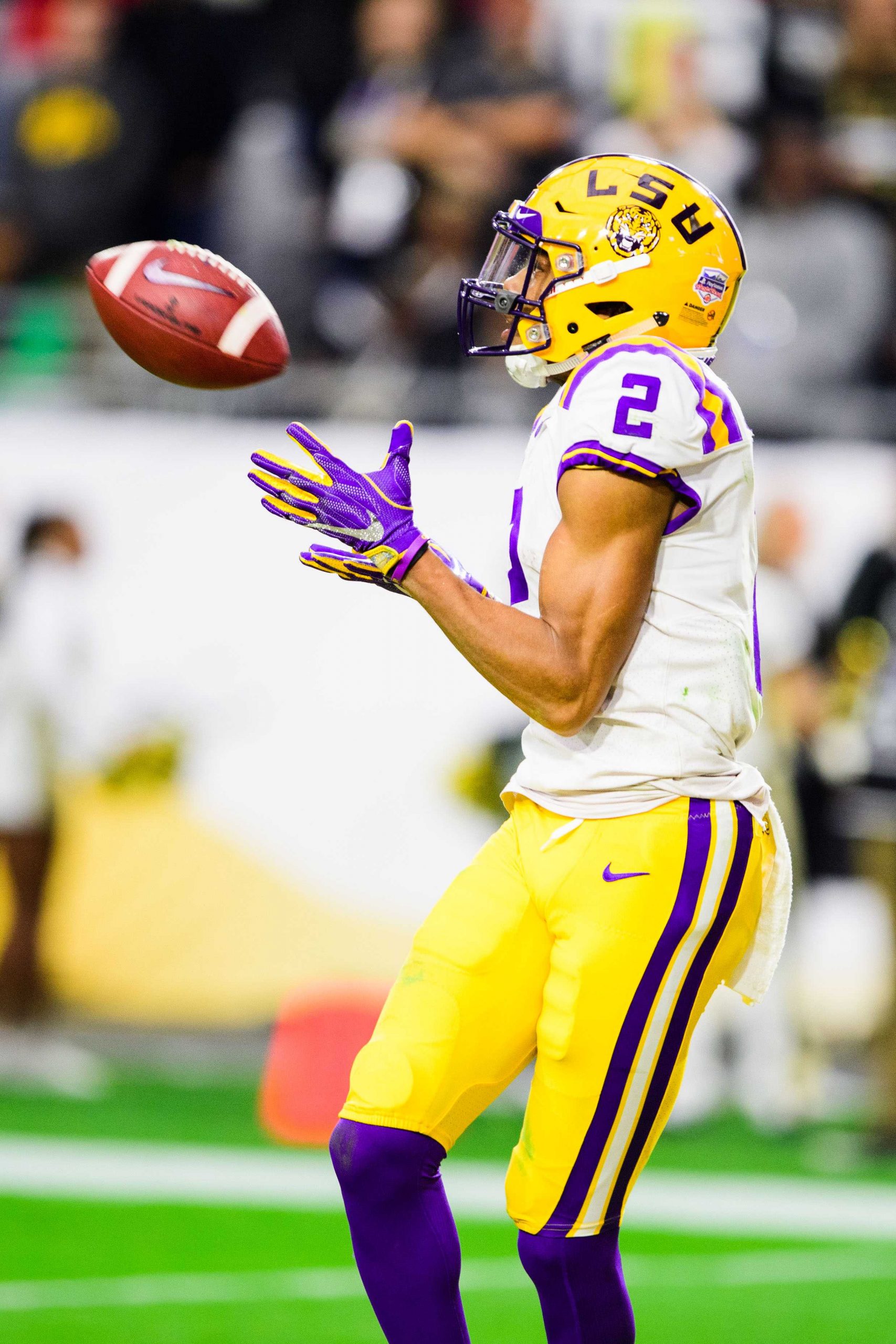 Justin Jefferson making a catch during an LSU football game