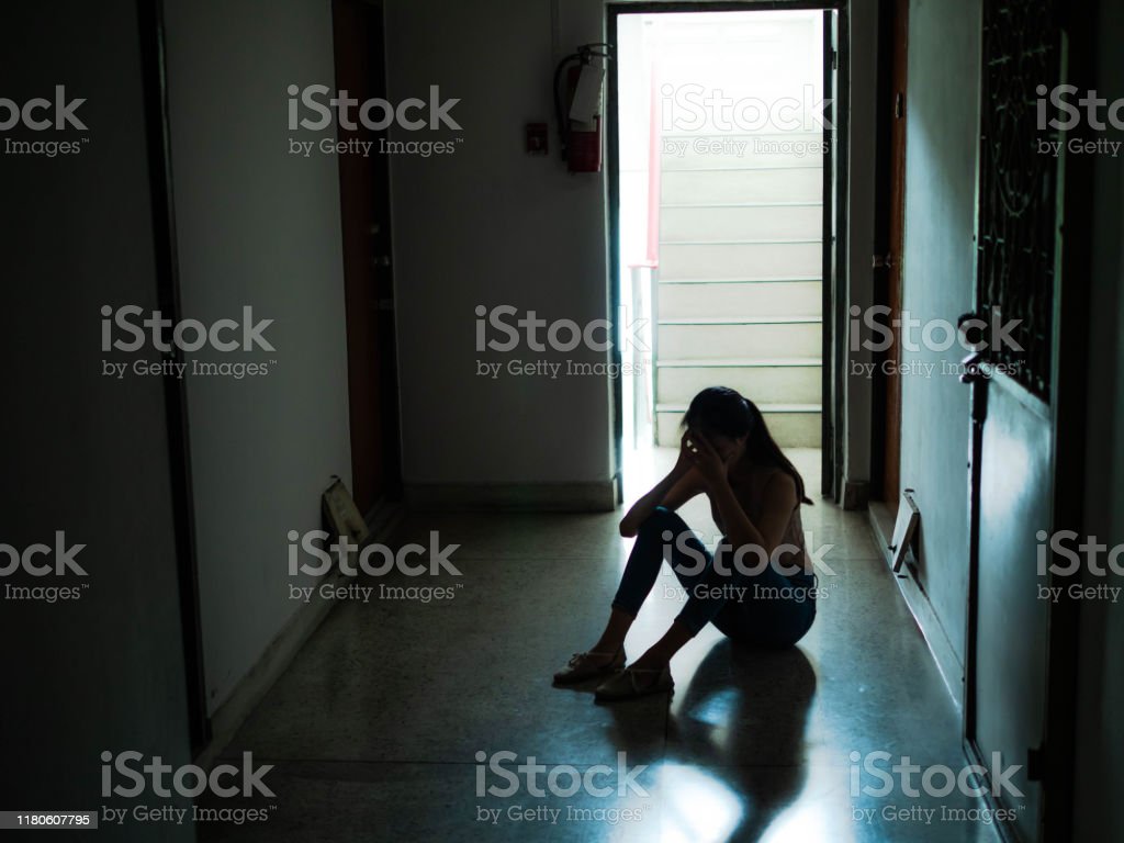 Sad Young Girl Sitting In The Darkl Domestic Violence Family