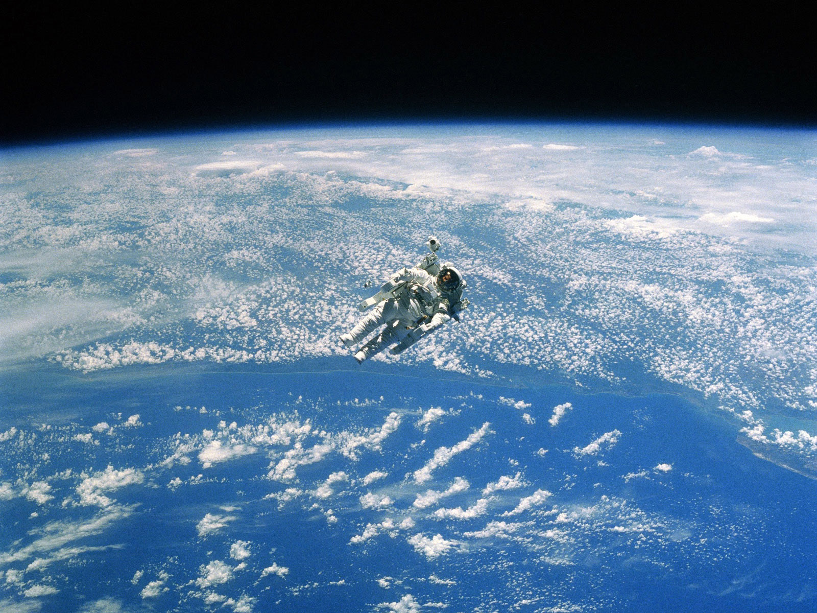 spacewalking astronaut nasa earth from space desktop wallpaper hdjpg