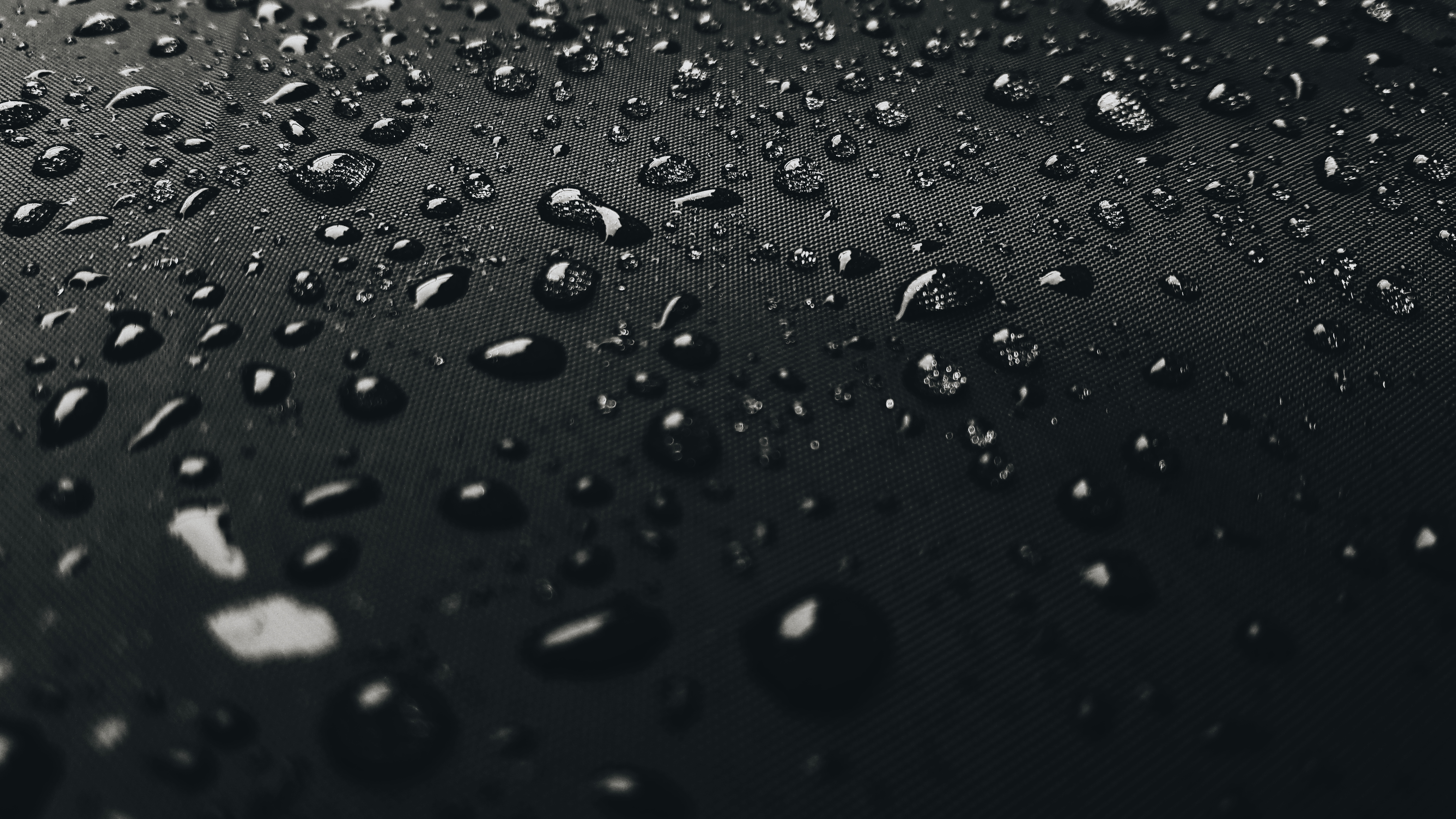 Water Drops On Black Surface 4k Wallpaper HD Others