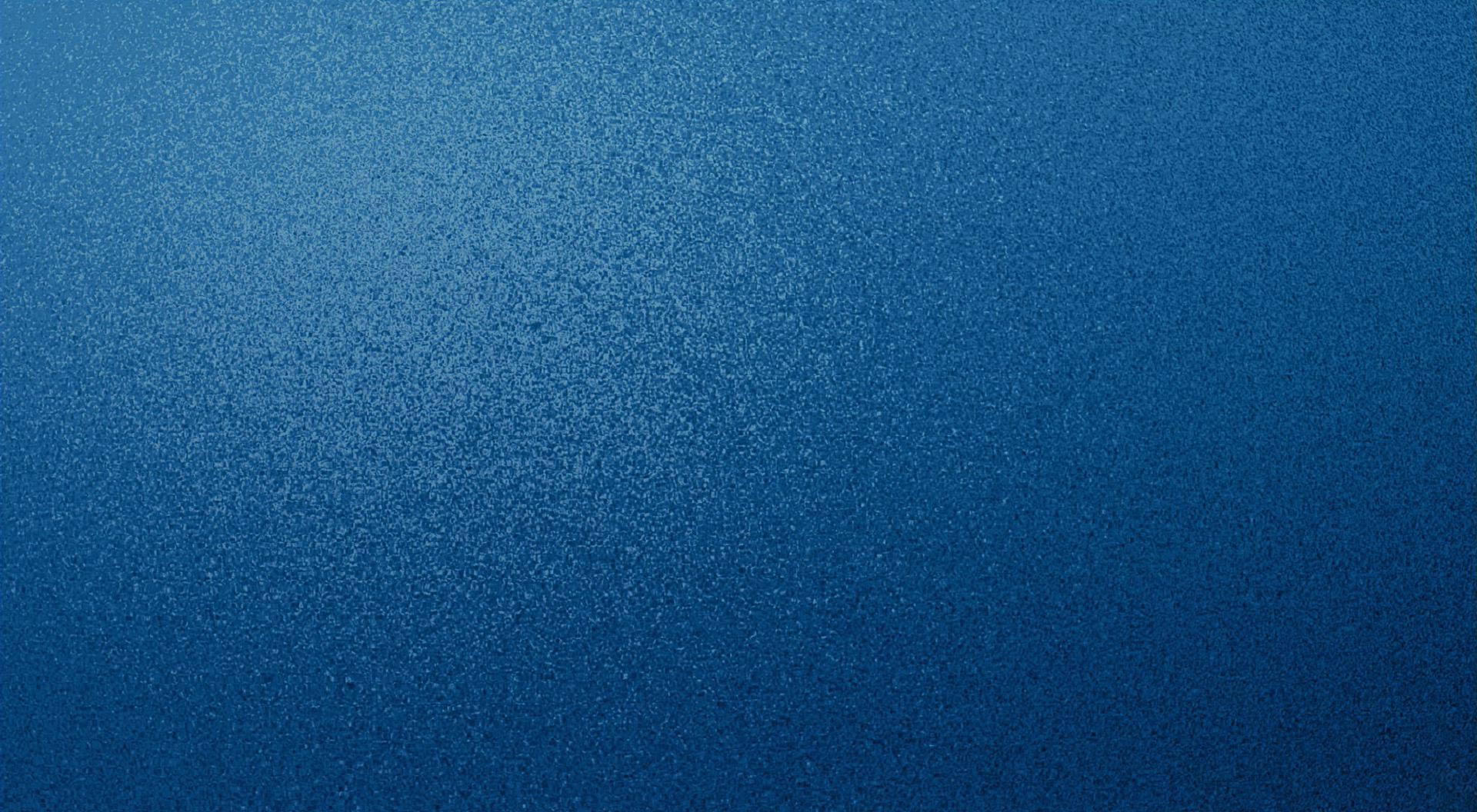 Blue textured speckled desktop background wallpaper for use with Mac