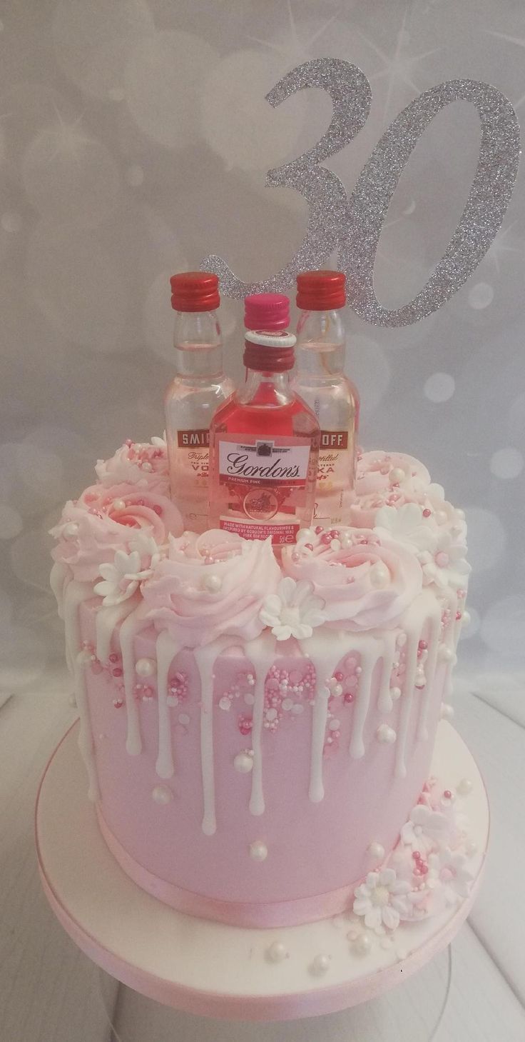 pink and white drip cake with Gin and Vodka 21st birthday cakes