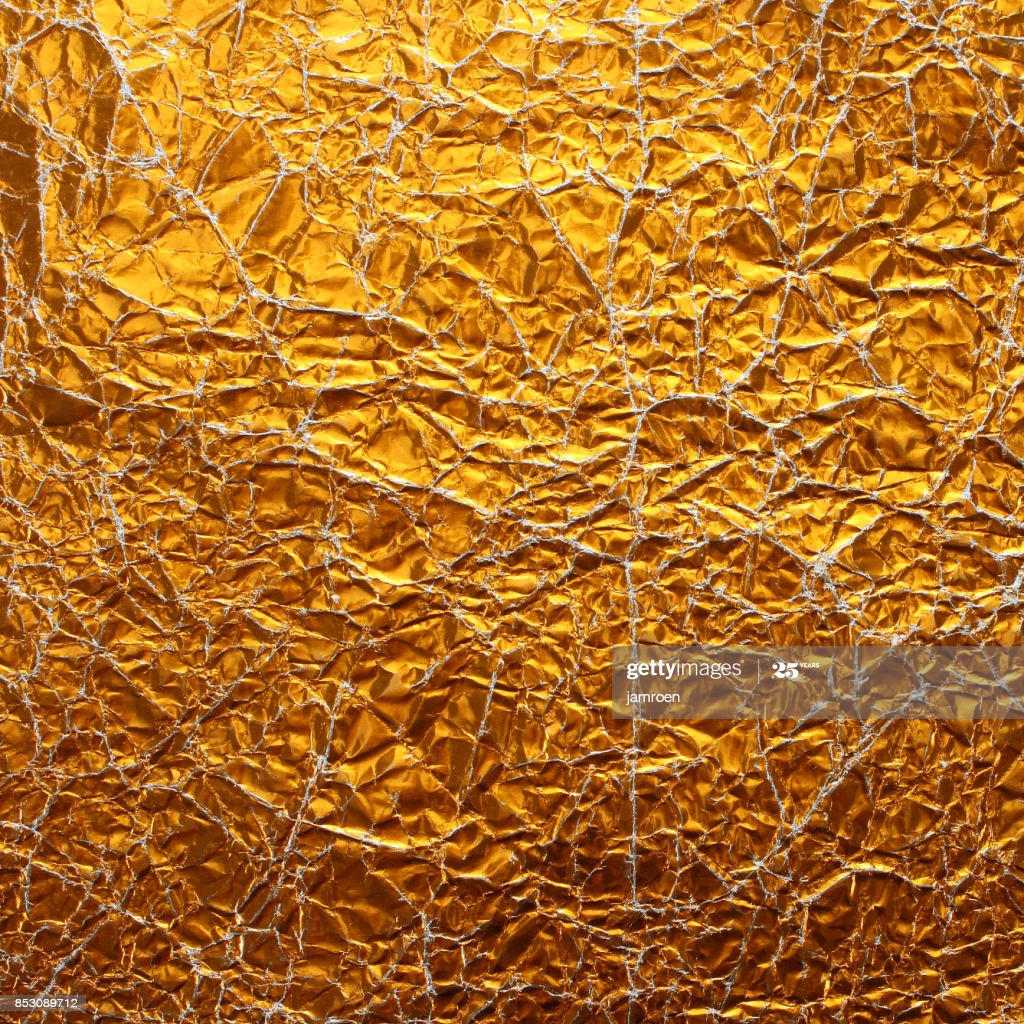 Gold Paper Wrinkled Background High Res Stock Photo Getty Image
