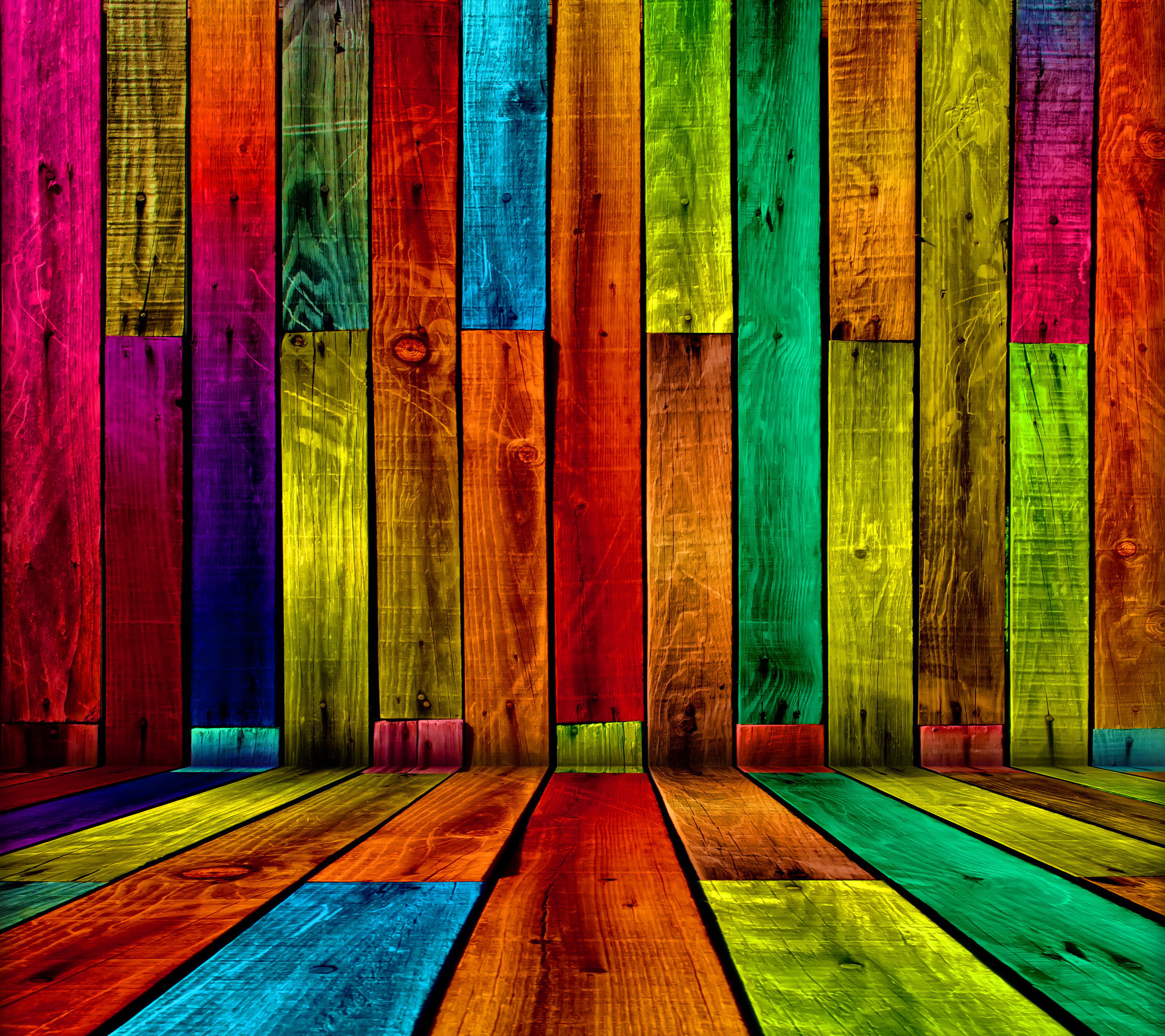 Vibrant abstract background with colorful wooden planks, perfect for a lively and creative wallpaper