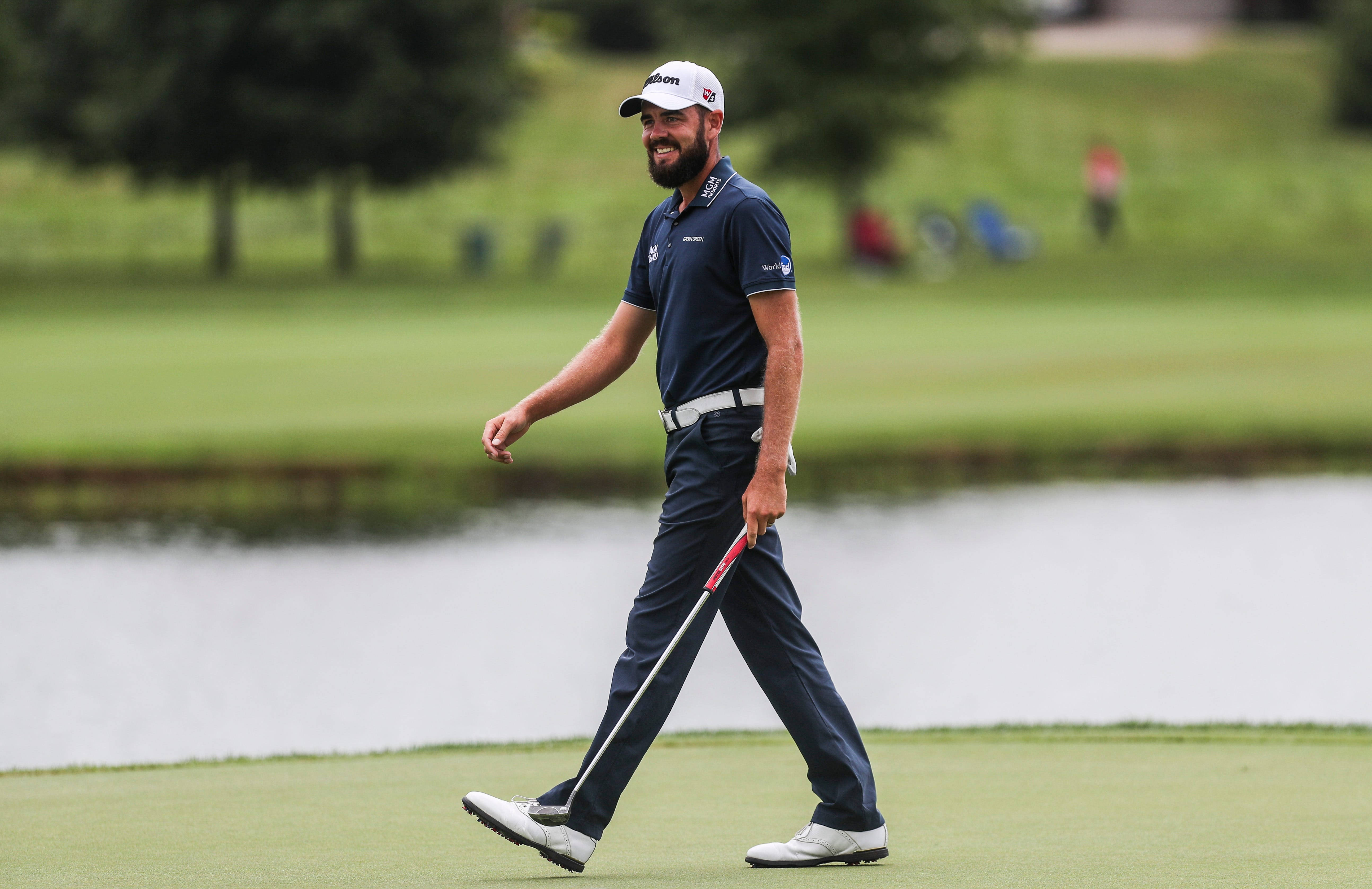 Troy Merritt Smiling While Walking Wallpaper