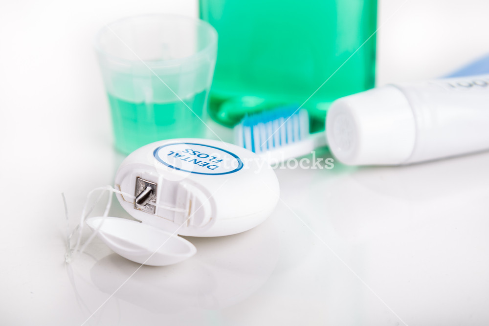 Dental Floss Focused With Toothbrush Toothpaste Mouthwash At