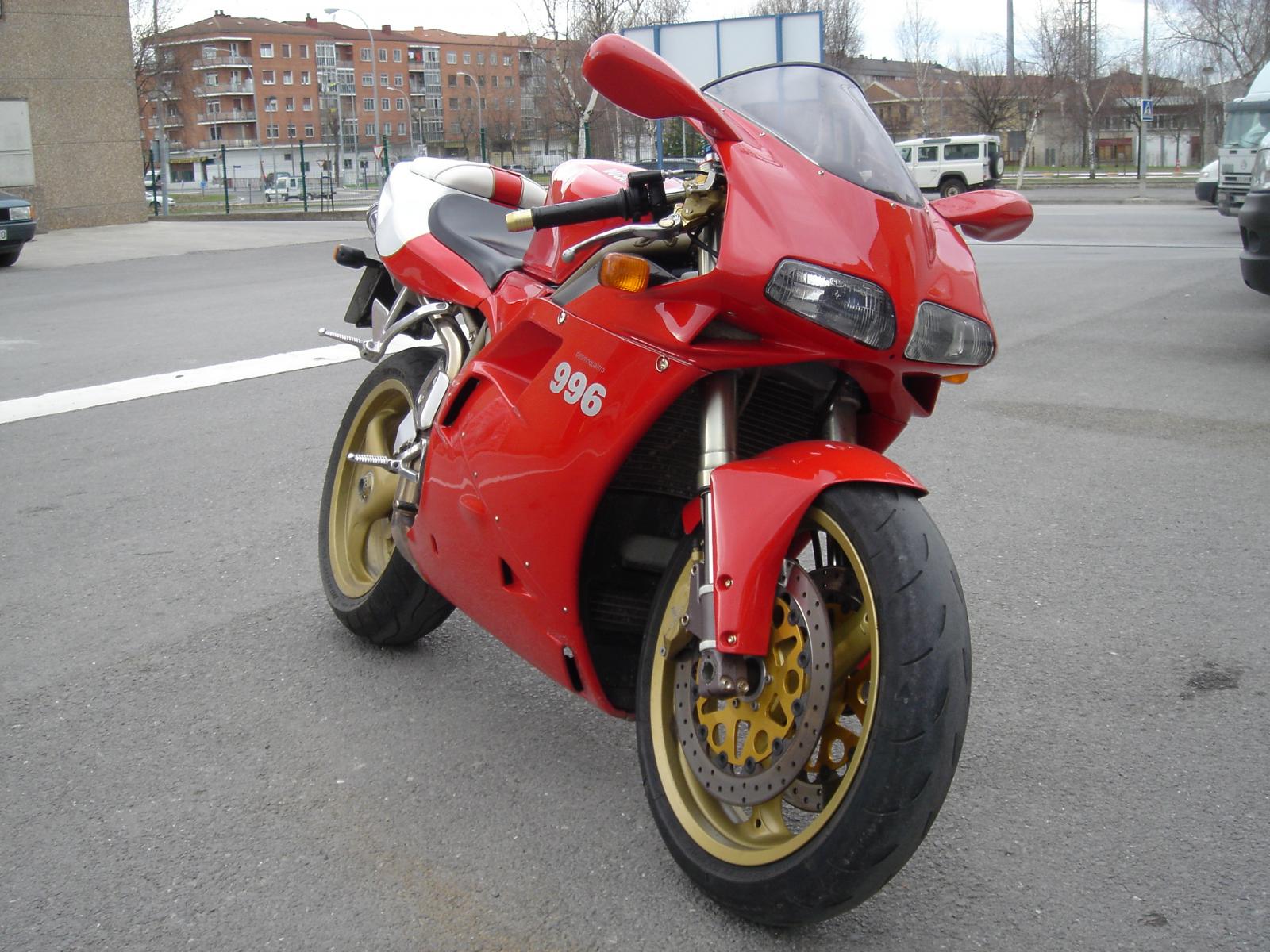 Red Ducati 996 Motorcycle Parked on Asphalt