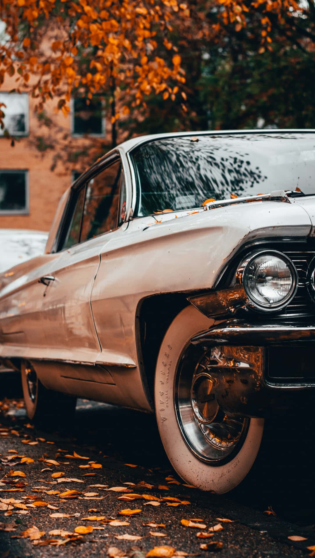 Vintage Car With Autumn Leaves iPhone Wallpaper