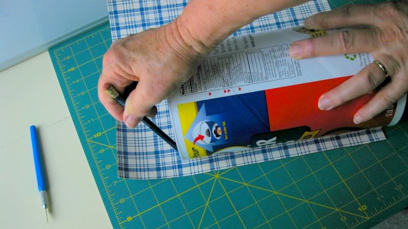 Mark The Paper To Perfect Size Allowing For An Overlapping Seam
