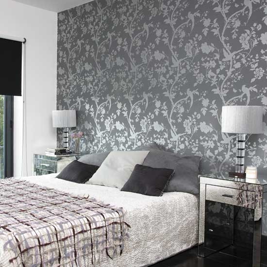 Bedroom with patterned wallpaper Bedroom designs Glass lamps 550x550