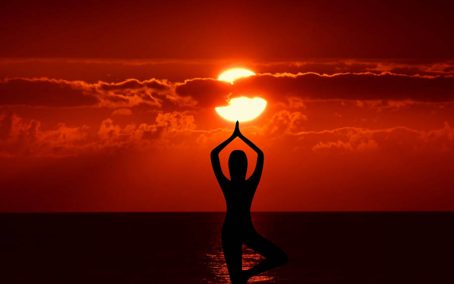 Silhouette Yoga Under Red Sun Wallpaper
