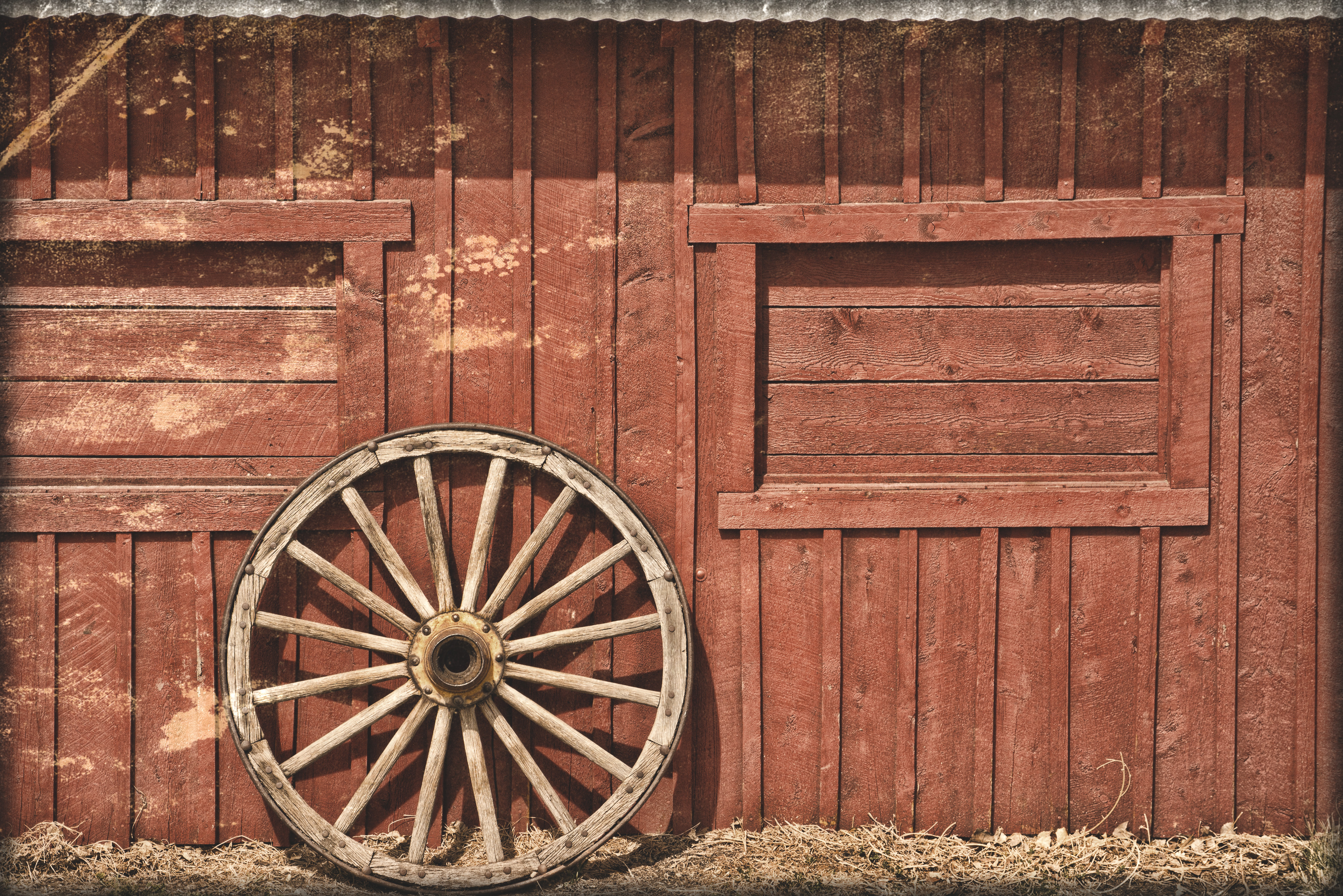 Red Barn And Wooden Wheel By Mudyfrog