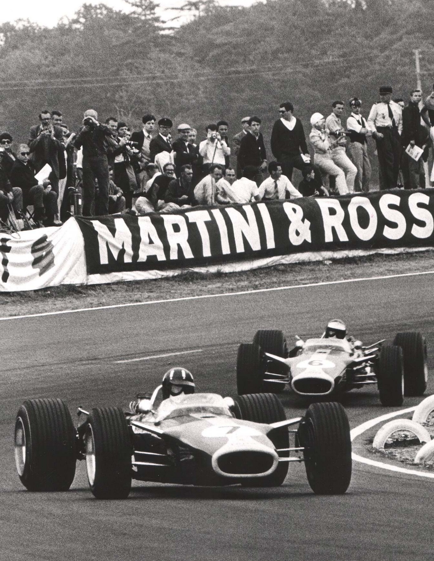 Jim Clark And Graham Hill Dueling In Their Lotus 49s During The