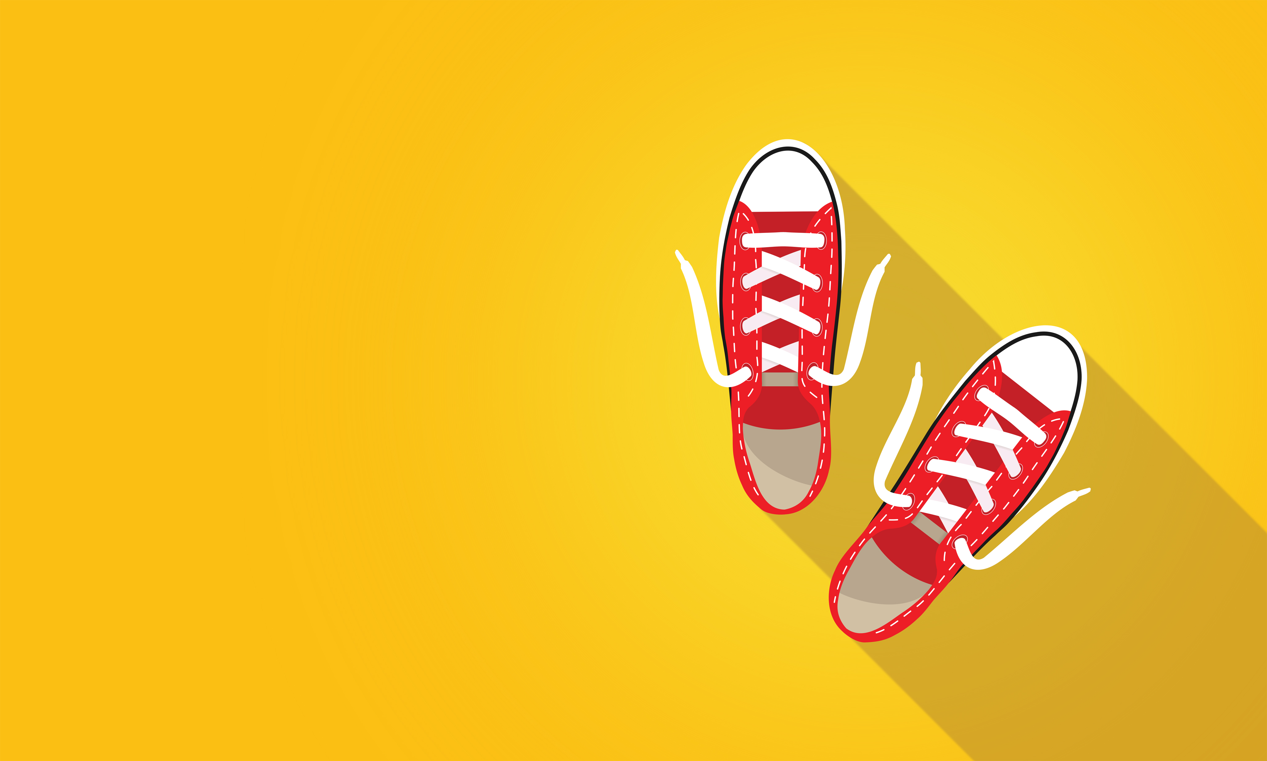 Photo Red Sneakers On Bright Yellow Background Abstract