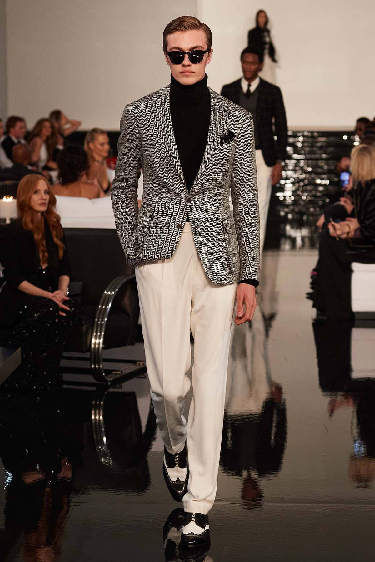 Ralph Lauren Corporation Gray Coat Walking Wallpaper