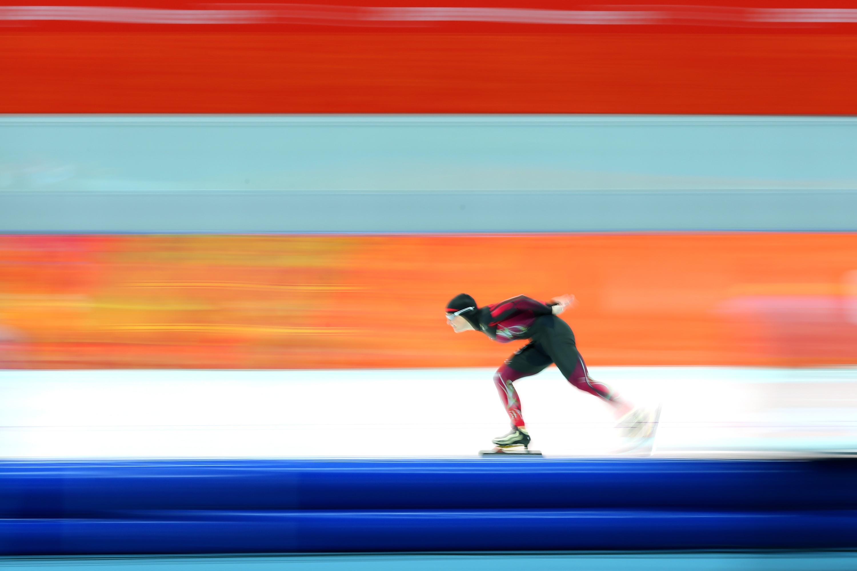 Speed Skating On Wall Background At The Olympics In Sochi
