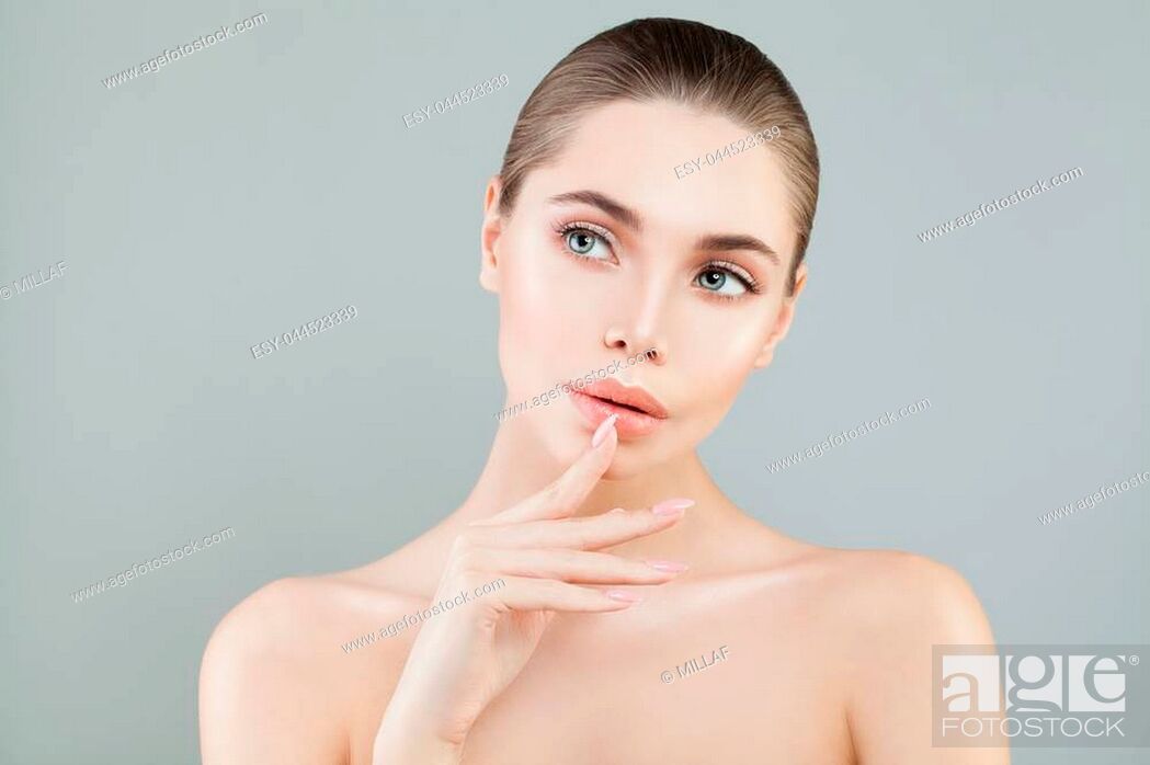 Odel Woman With Healthy Skin On Blue Background Girl Thinking