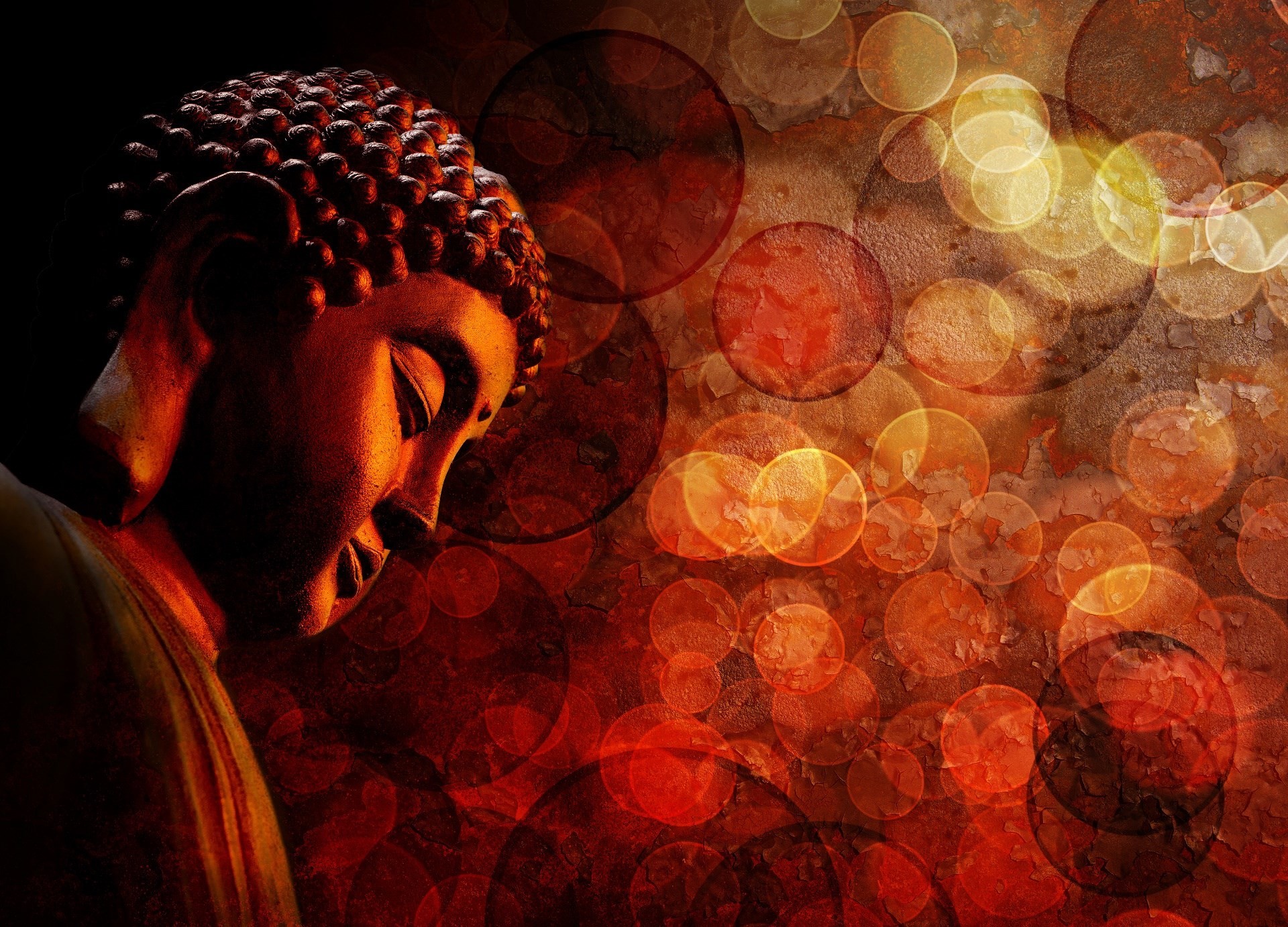 Serene Buddha statue against a backdrop of warm, glowing bokeh, evoking a sense of peace and tranquility