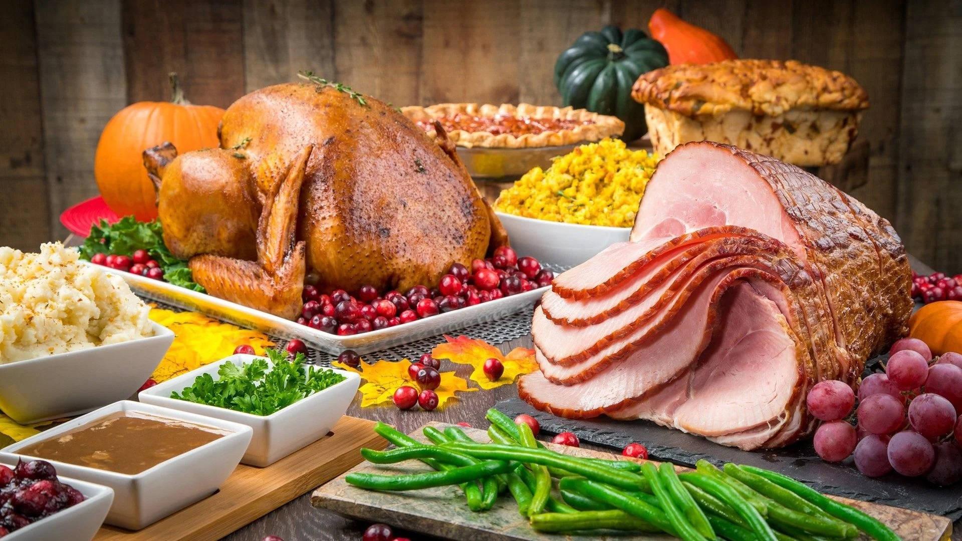 A Sumptuous Feast Of Ham And Roasted Turkey For Dinner