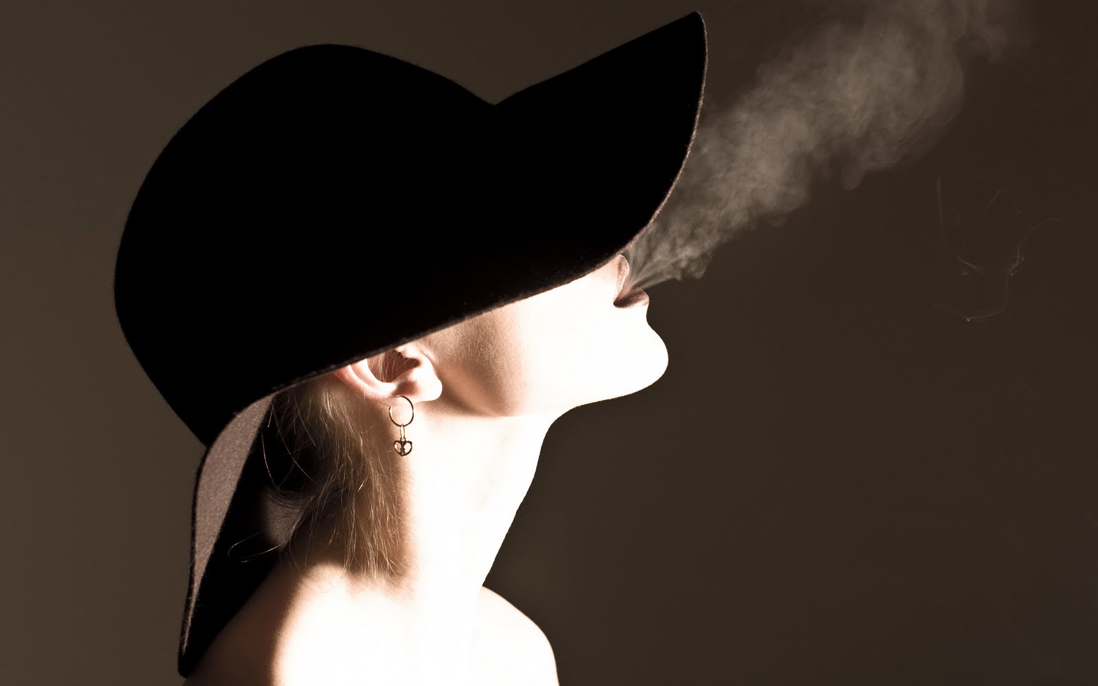  girl with cap smoking blowing smoke hd 2011 free download wallpapers