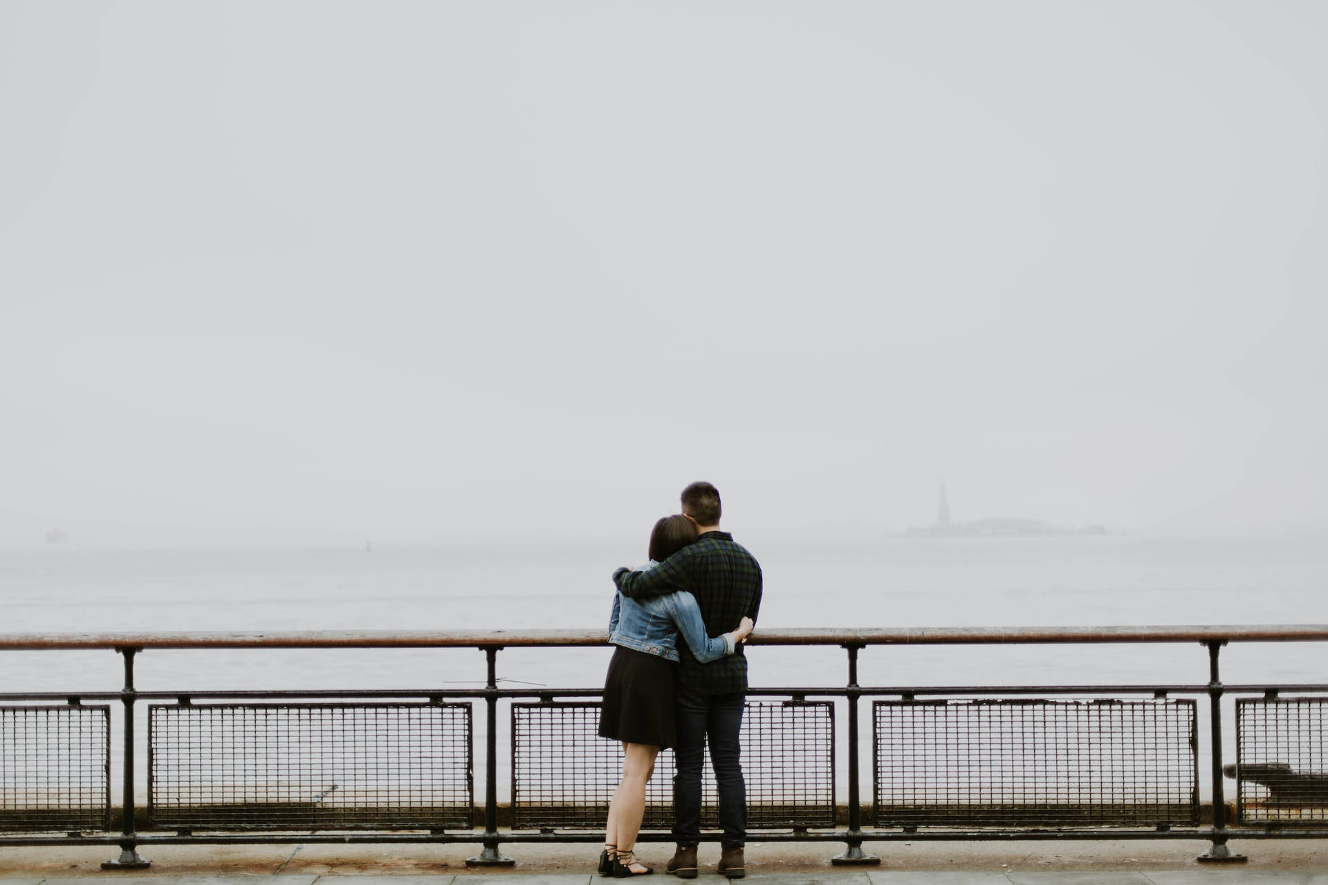 Couple Hugging Side By Wallpaper