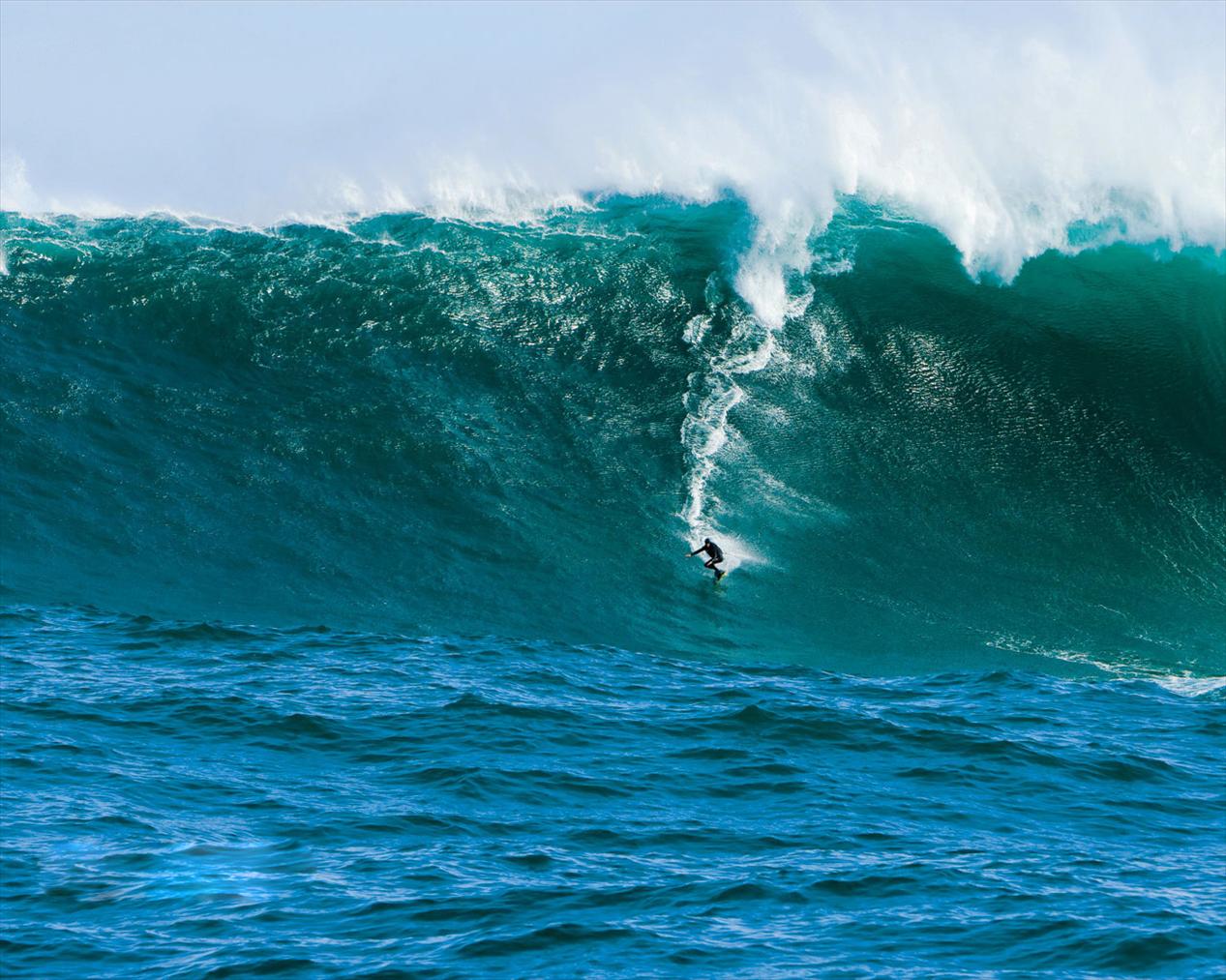 Download Big Waves wallpaper surfing on huge wave