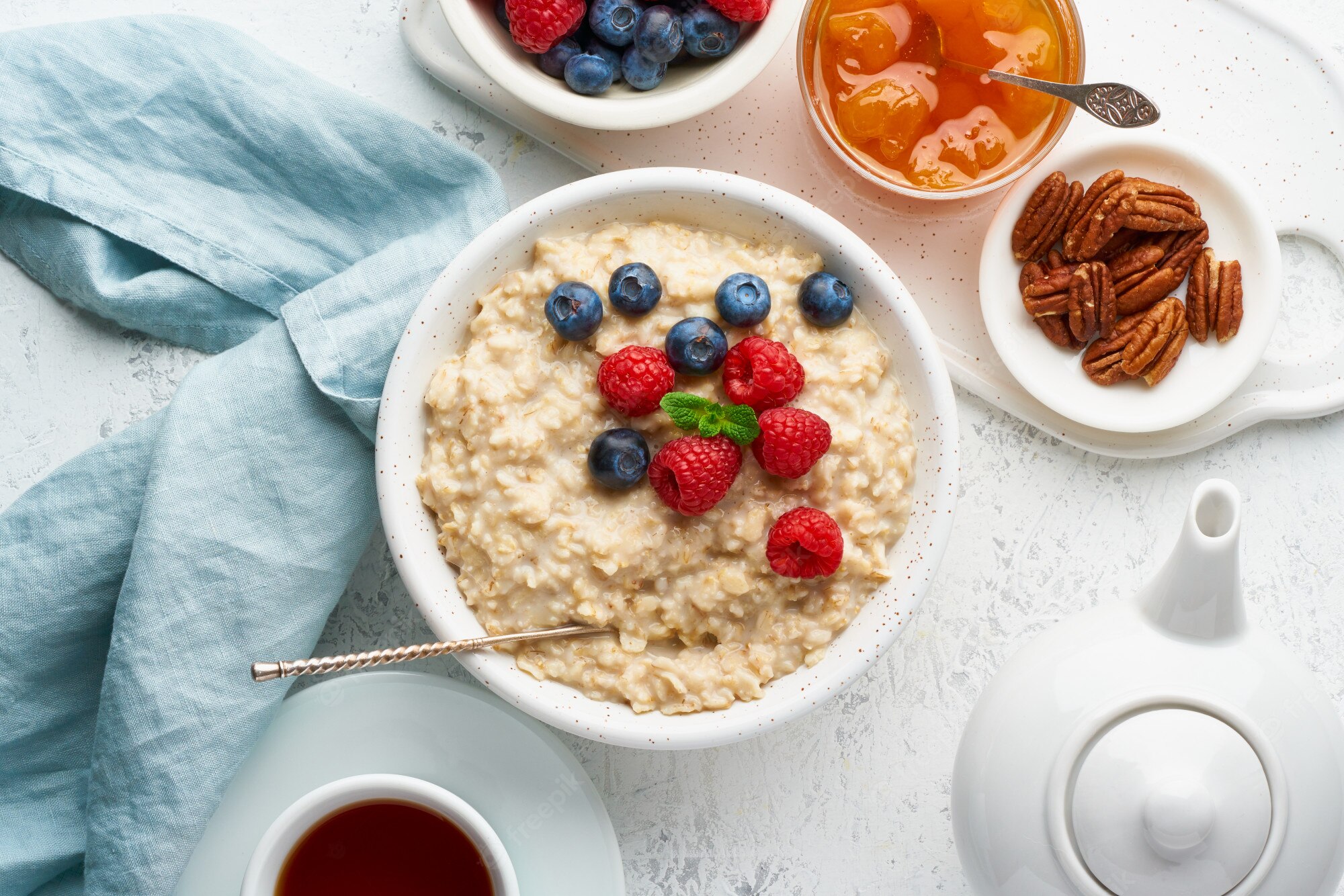 Premium Photo Oatmeal Porridge With Blueberry Raspberries Jam