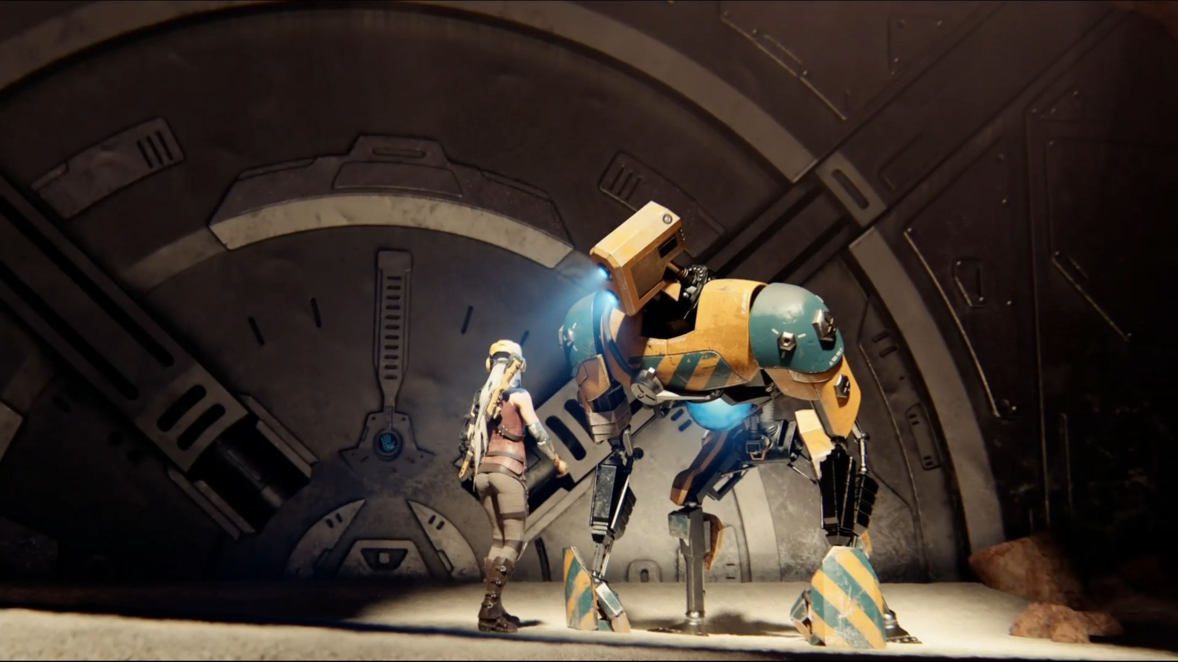 A woman in post-apocalyptic attire stands next to a large, mechanical robot in front of a massive metal door in a 4k wallpaper