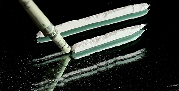Videohive Cocaine Snorted Through Rolled Dollar Banknote