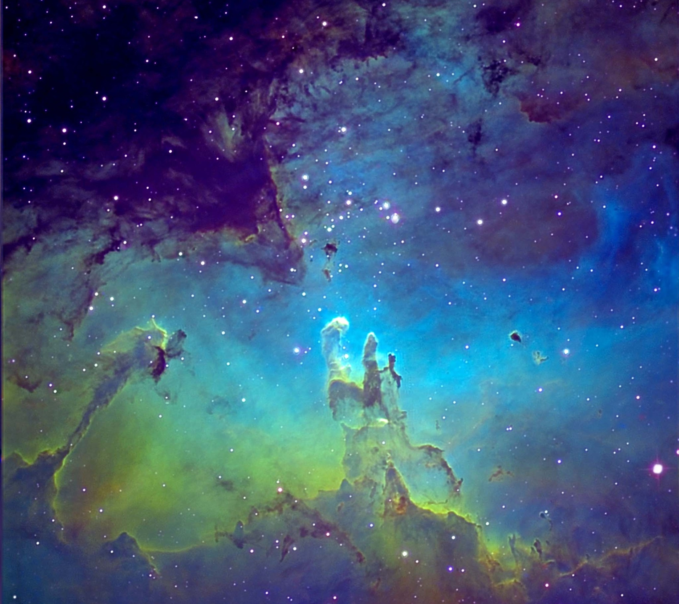 A breathtaking view of the Eagle Nebula, a stunning star-forming region in the constellation Serpens, showcasing its vibrant colors and intricate structures