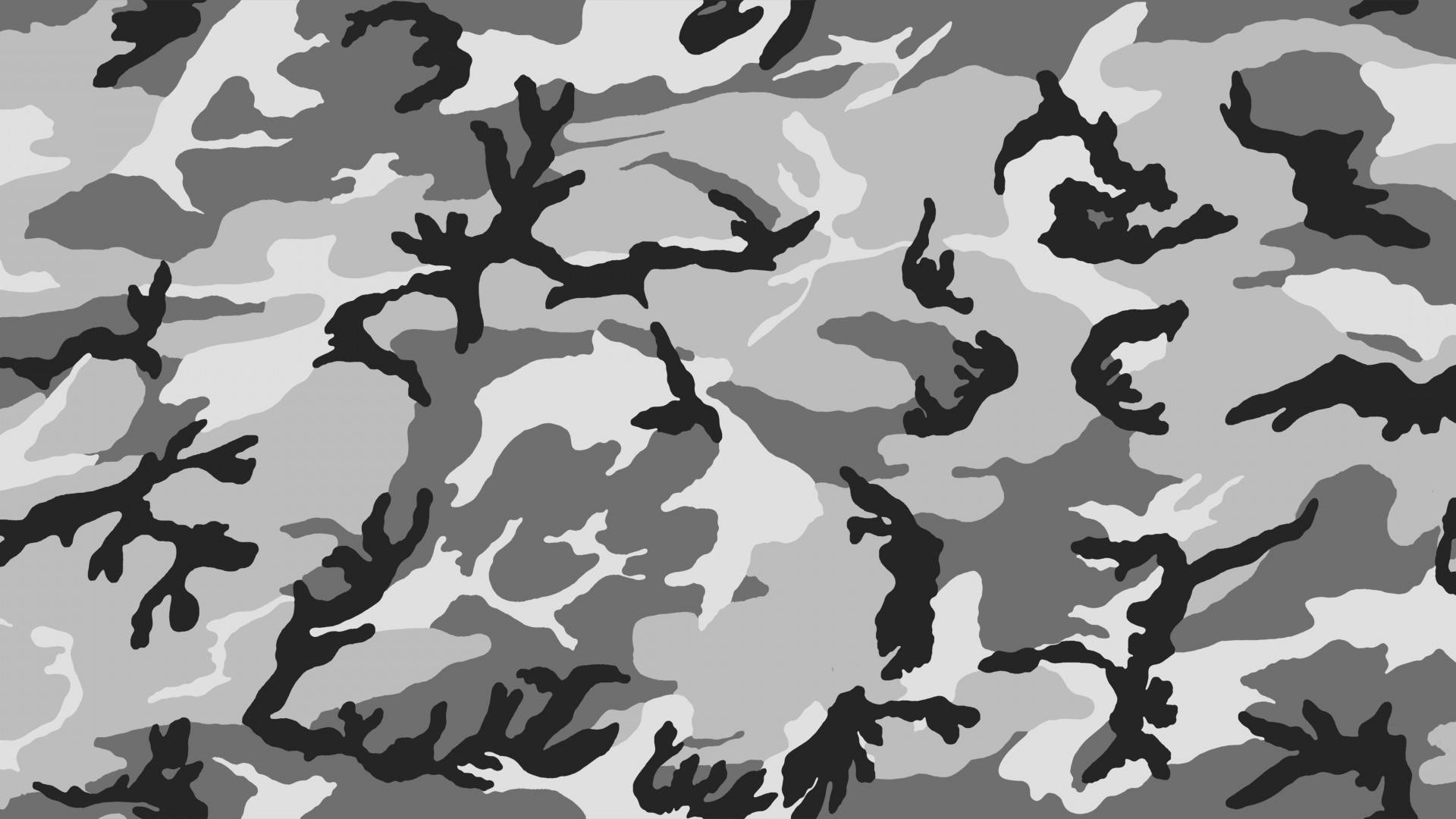 A seamless camouflage pattern in shades of gray and black, ideal for wallpapers or backgrounds