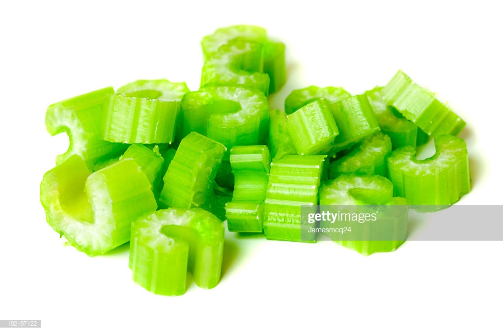 Pile Of Chopped Celery Isolated On White Background Stock Photo