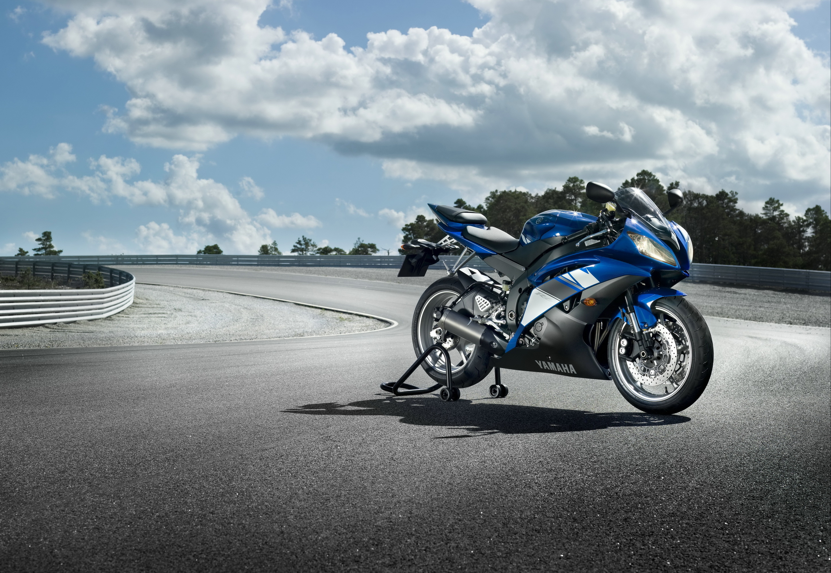 Blue Yamaha R6 Sportbike on Racetrack