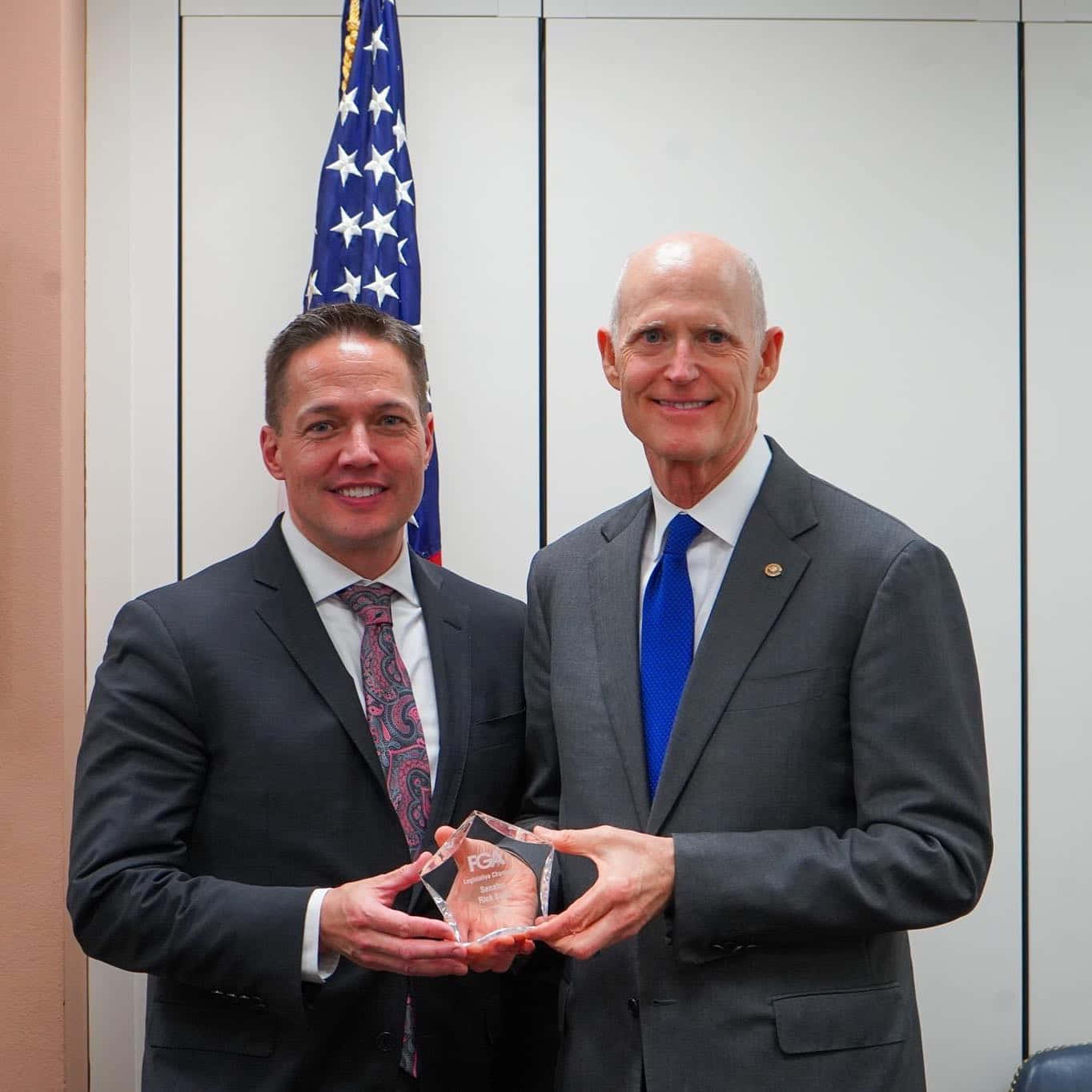 Rick Scott Receiving Trophy Award Wallpaper