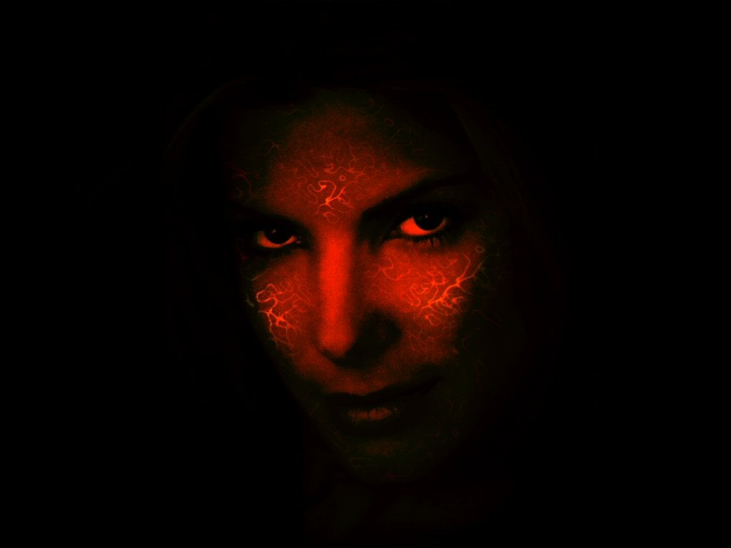 Desktop wallpaper for red face black background 1024x768