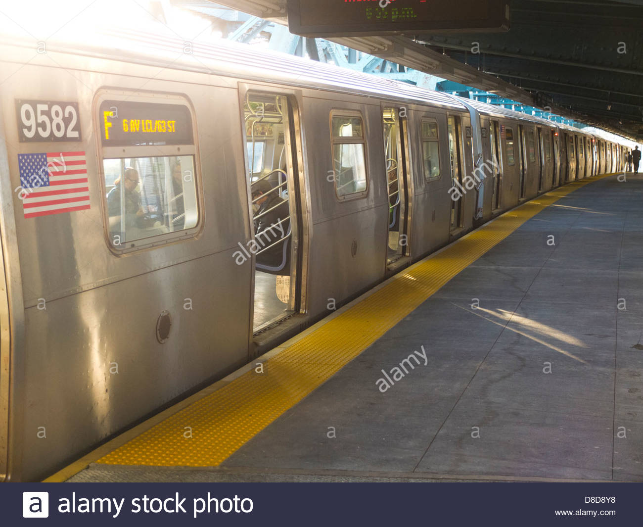 Subway Train With New York City In Background Stock Photo