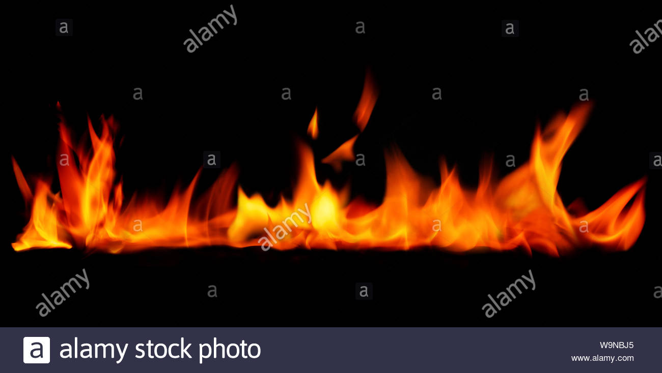 Orange Flaming Fire Isolated On Black Background Stock Photo