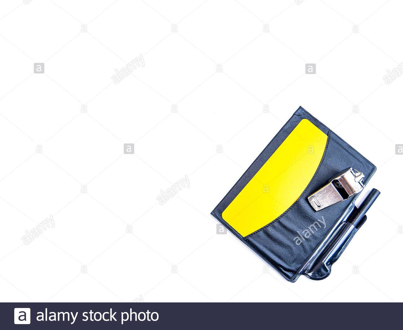 Yellow Card And Whistle Of A Football Referee On White