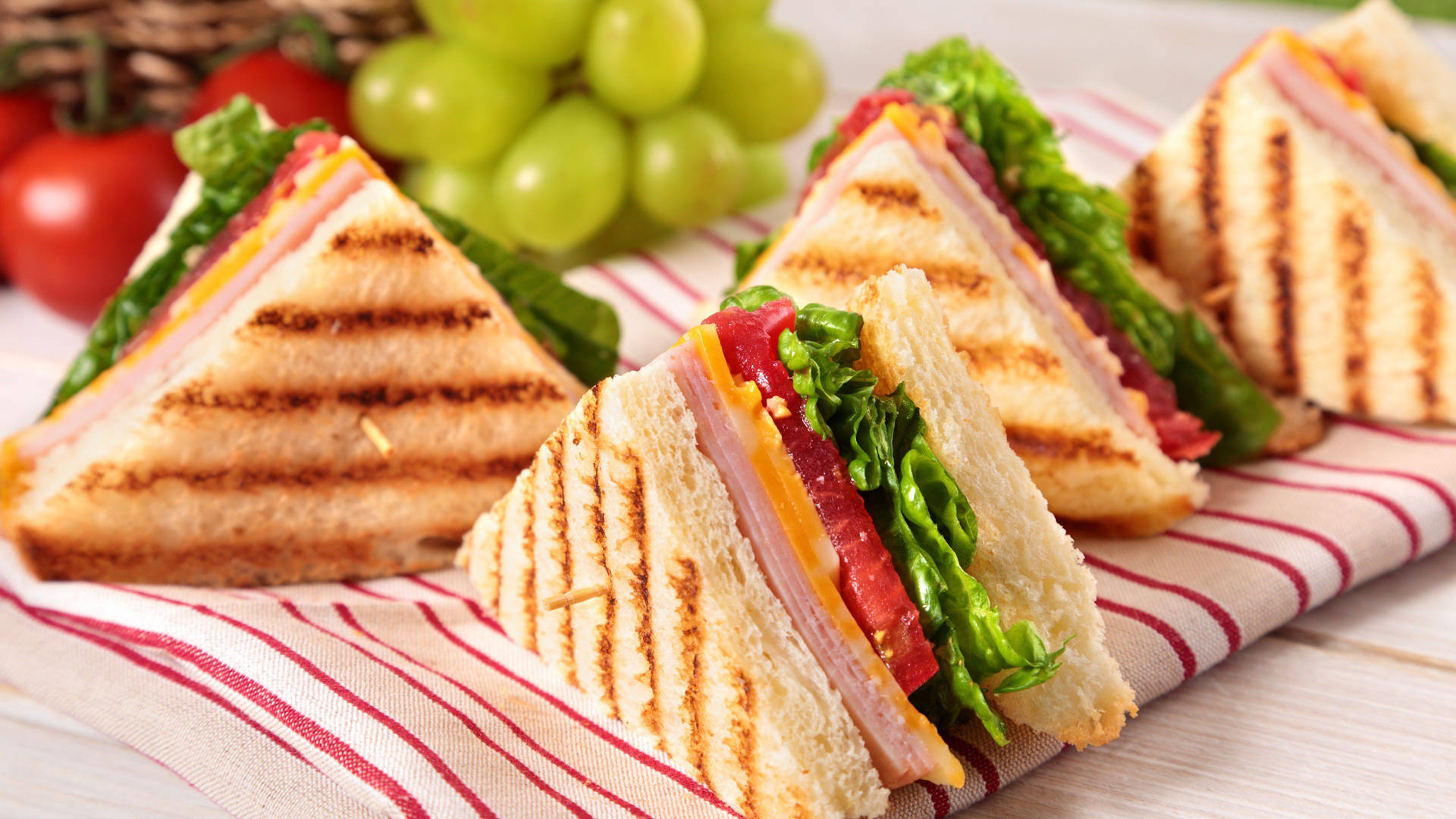 Art Of Delicious Grilled Club Sandwiches In Food Photography Wallpaper